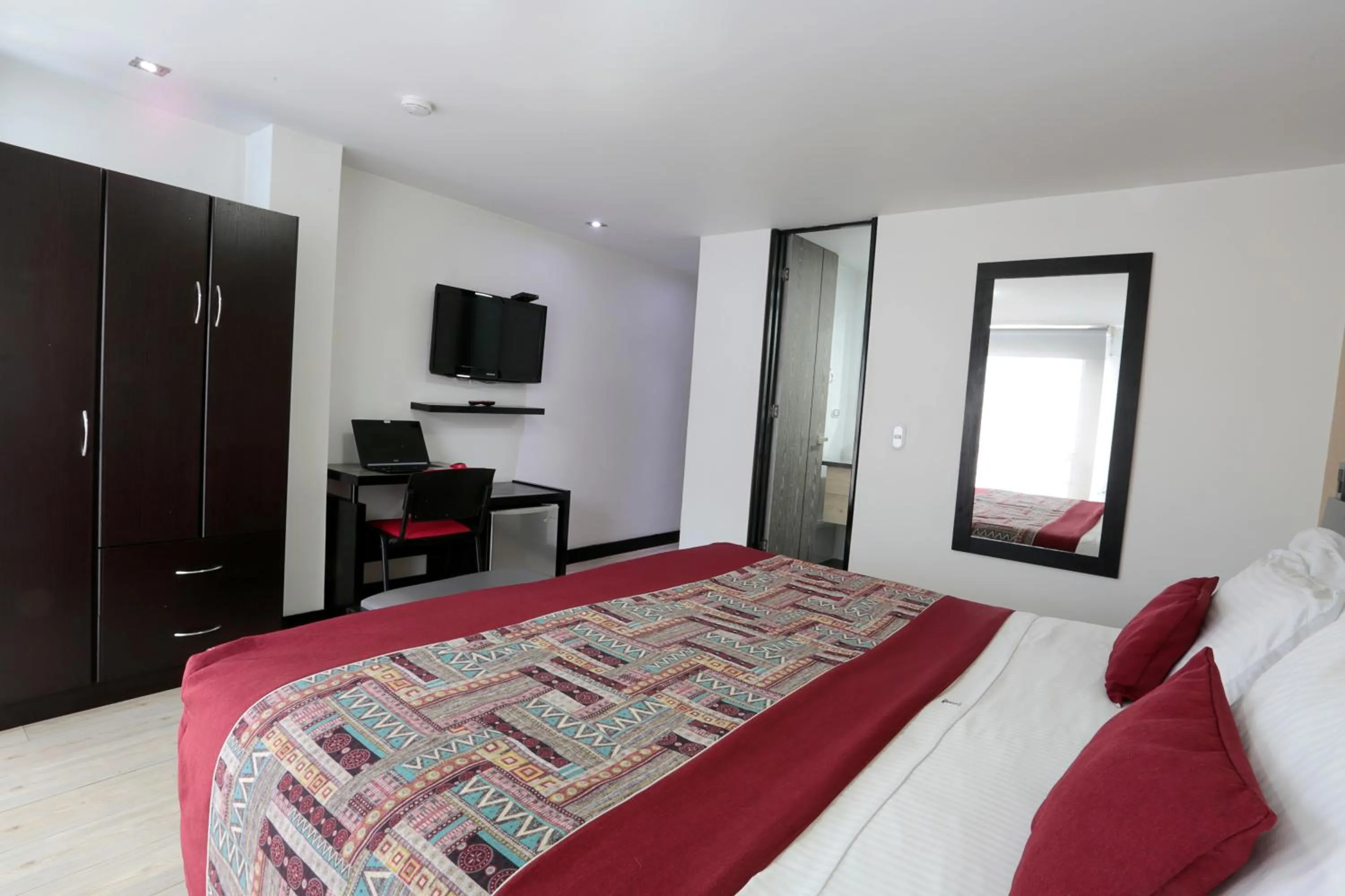 View (from property/room), Bed in Hotel Bogota Expocomfort - Embajada Americana