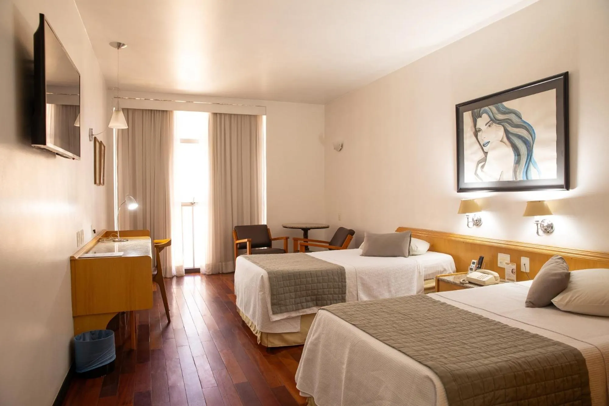 Bed in Ritz Plaza Hotel