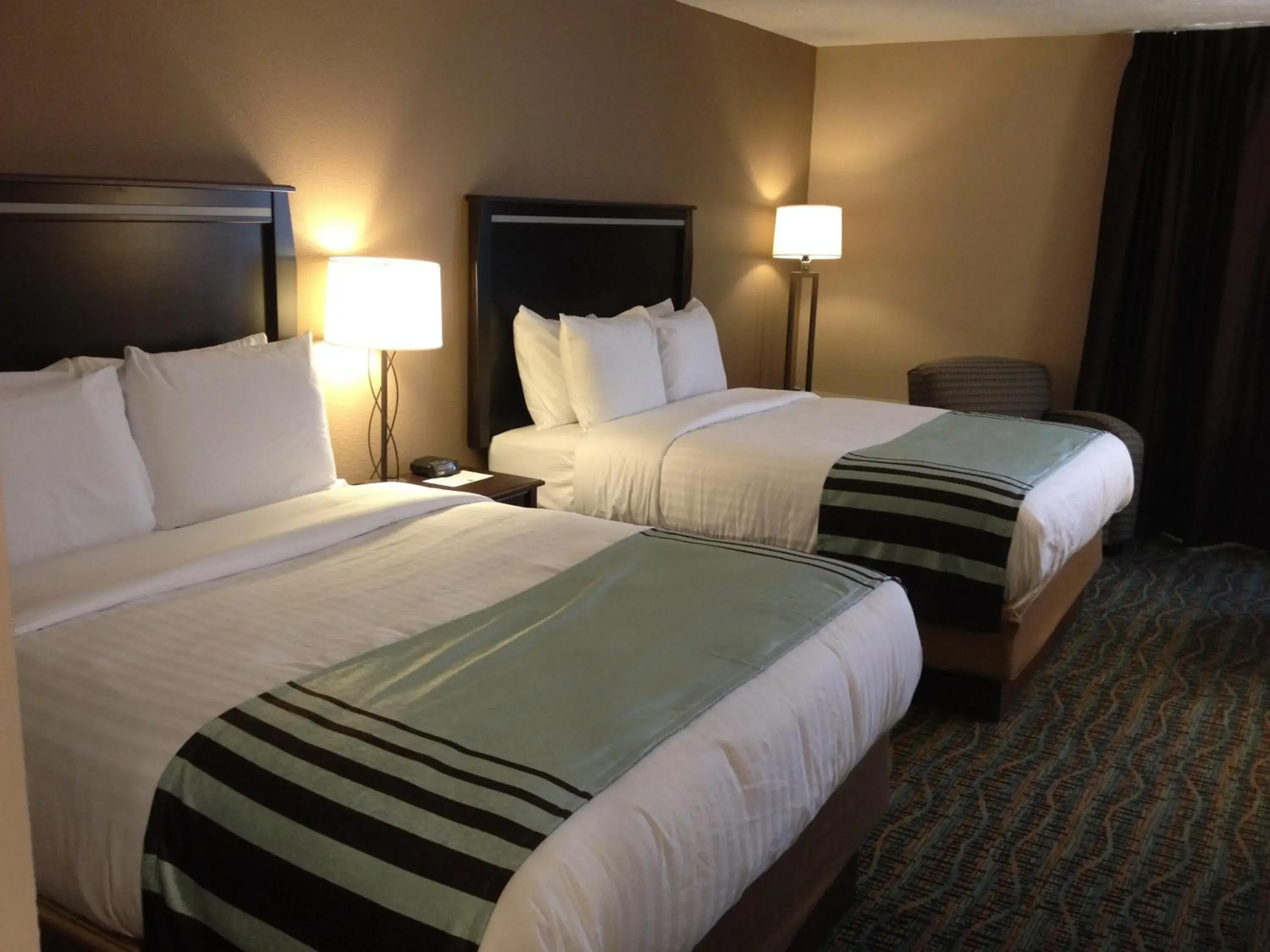 Bed in Boarders Inn & Suites by Cobblestone Hotels - Grand Island Bed in Boarders Inn & Suites by Cobblestone Hotels - Grand Island