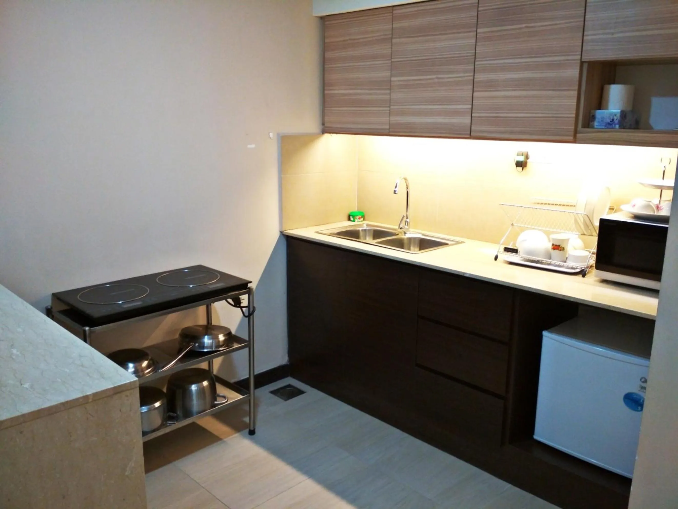 Kitchen or kitchenette in Classy Studio Apartment (KBCP)