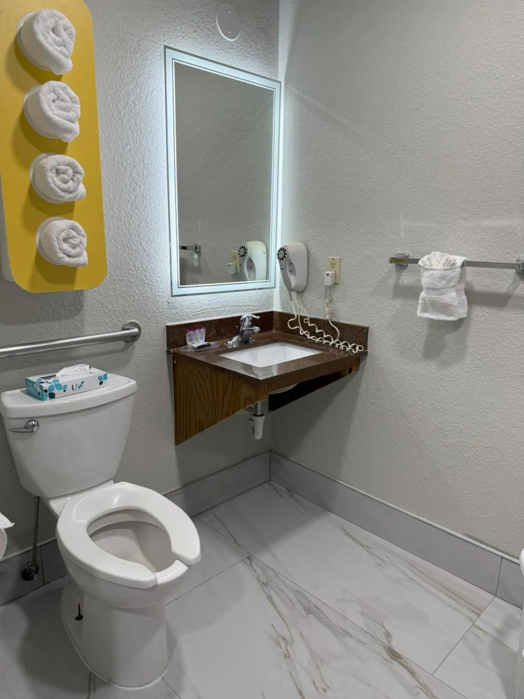 Toilet in TownHouse Extended Stay Hotel Downtown