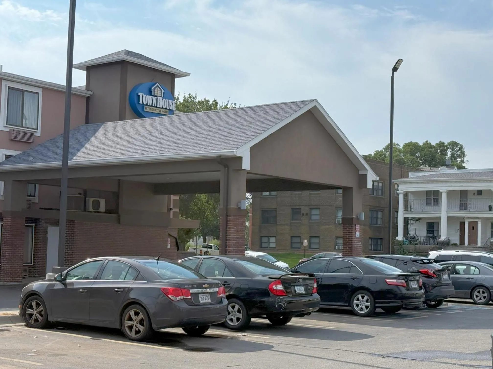 Property building in TownHouse Extended Stay Hotel Downtown