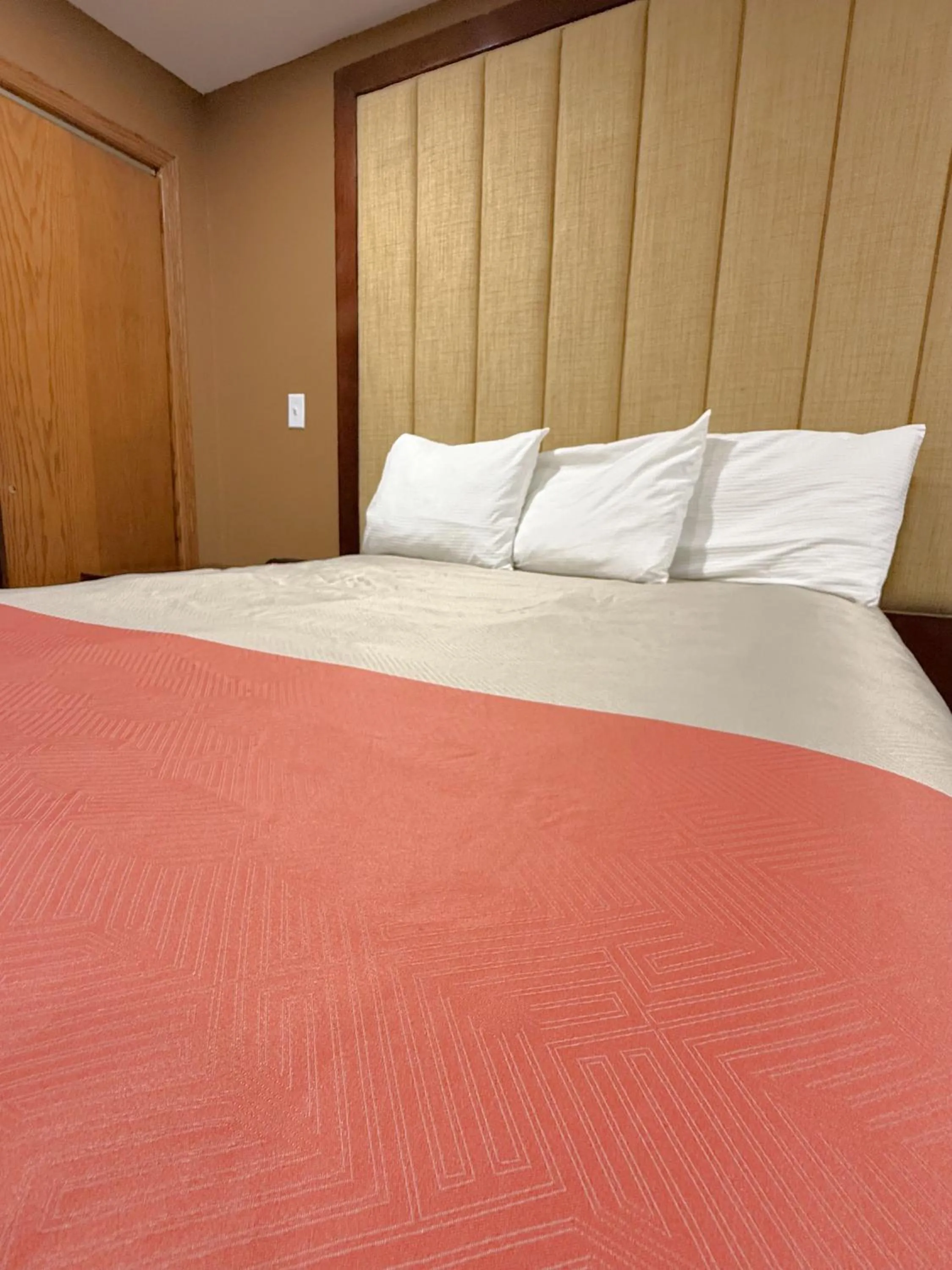 Bed in TownHouse Extended Stay Hotel Downtown