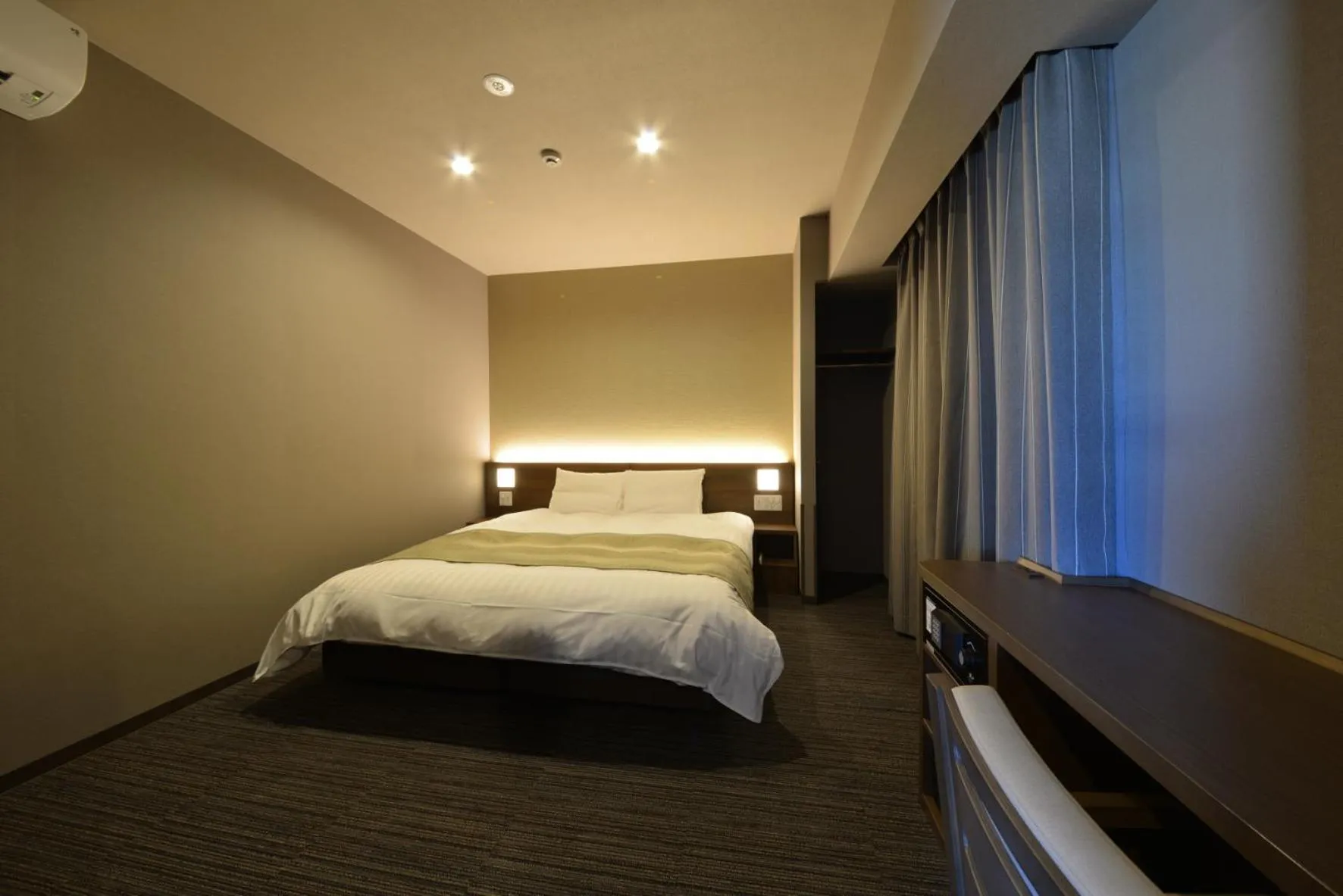 Bed in Dormy Inn Takamatsu Chuo Koenmae Natural Hot Spring