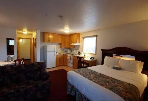 Bed in Executive House Suites Hotel & Conference Centre