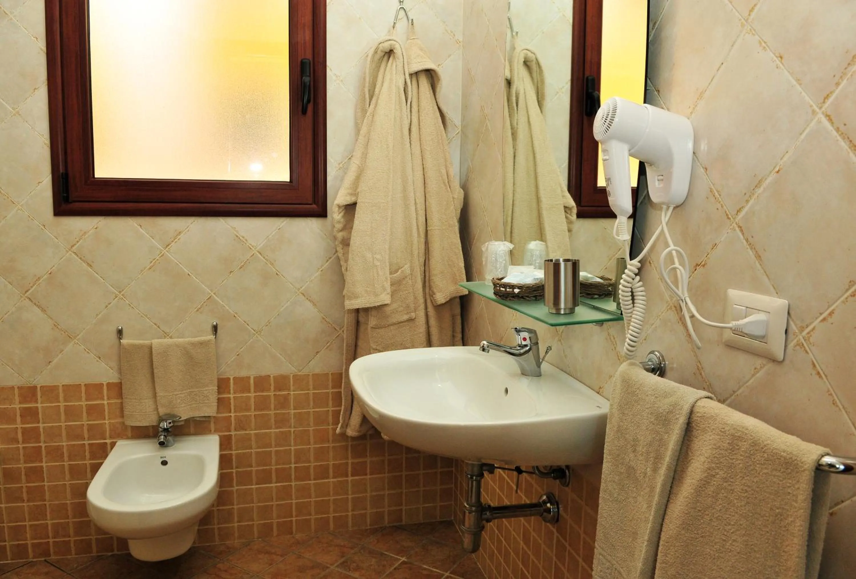 Bathroom in Hotel Castello Budoni