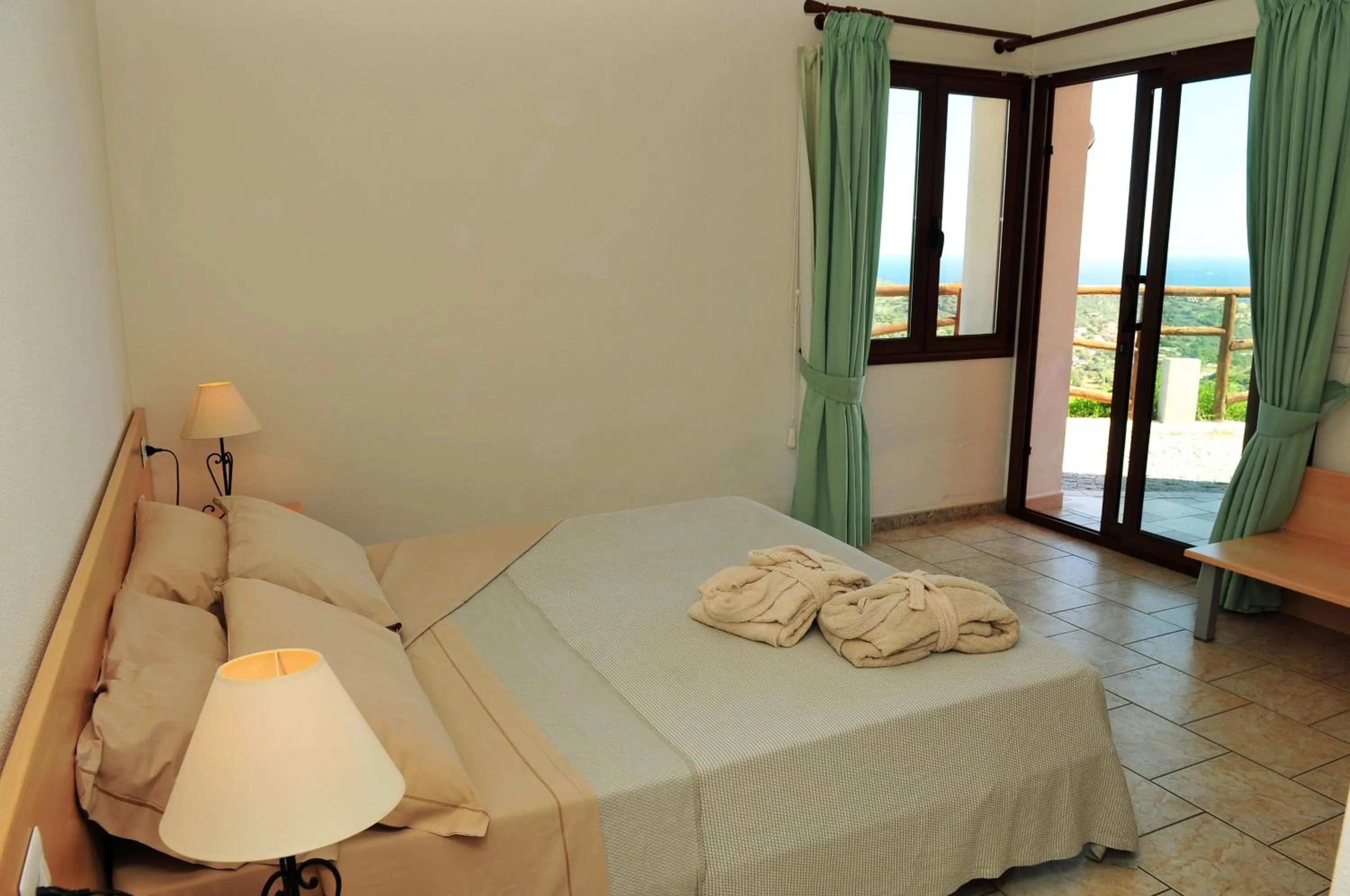 Patio, Bed in Hotel Castello Budoni