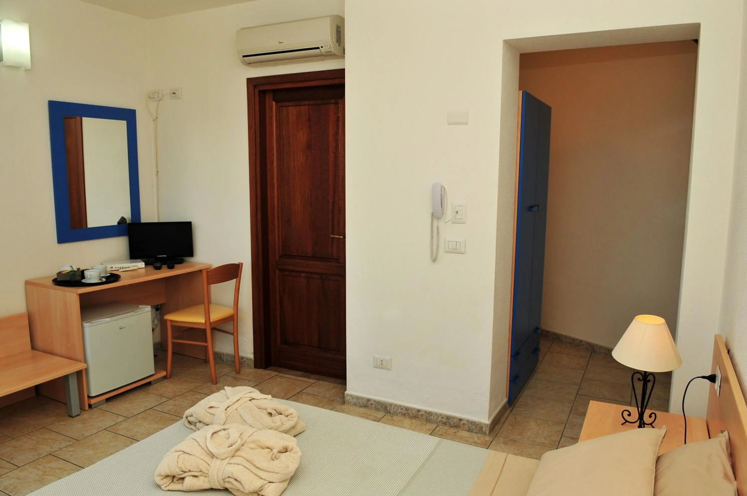 Photo of the whole room in Hotel Castello Budoni