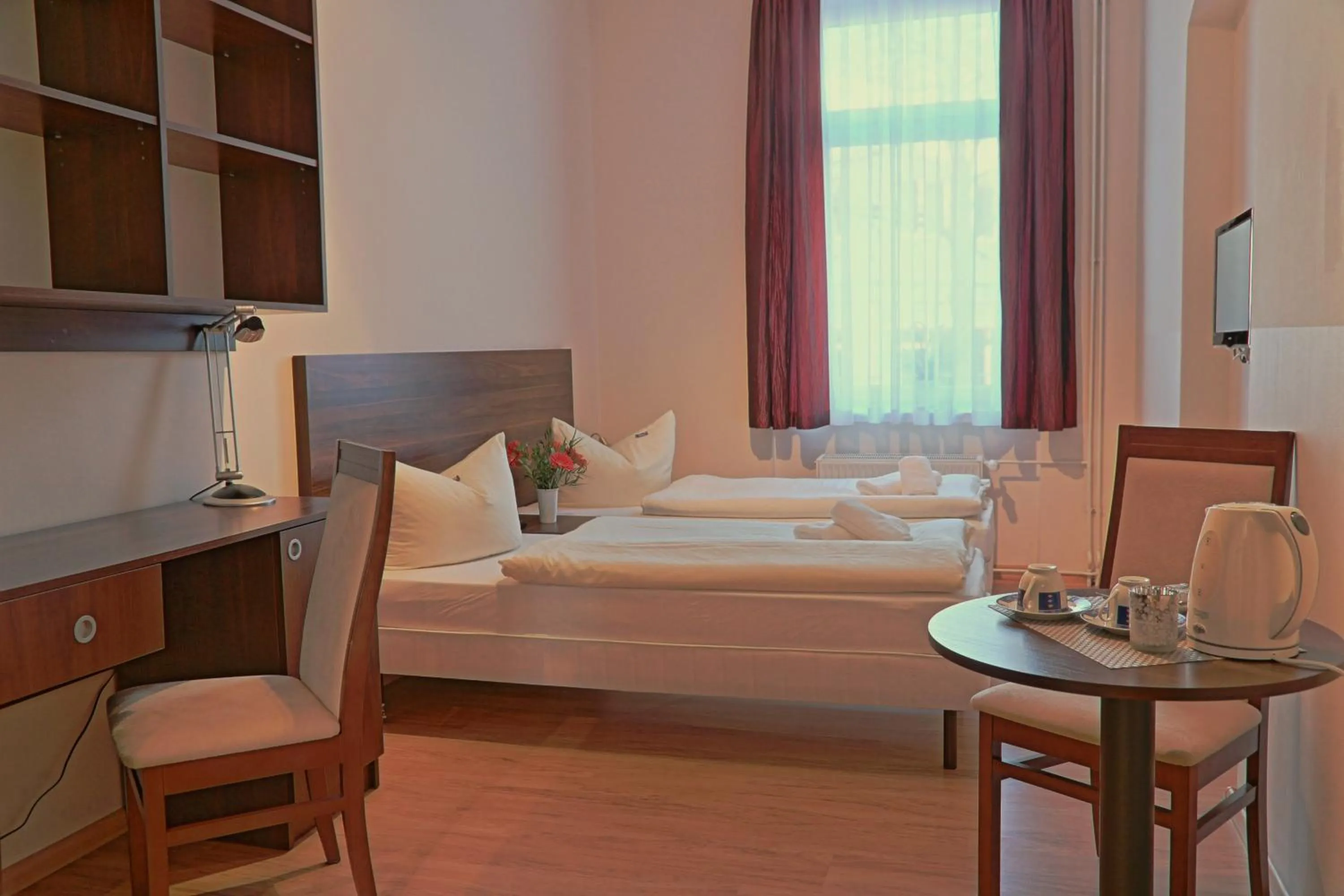 Photo of the whole room, Bed in City Residence Hotel Frankfurt-Oder Bahnhof