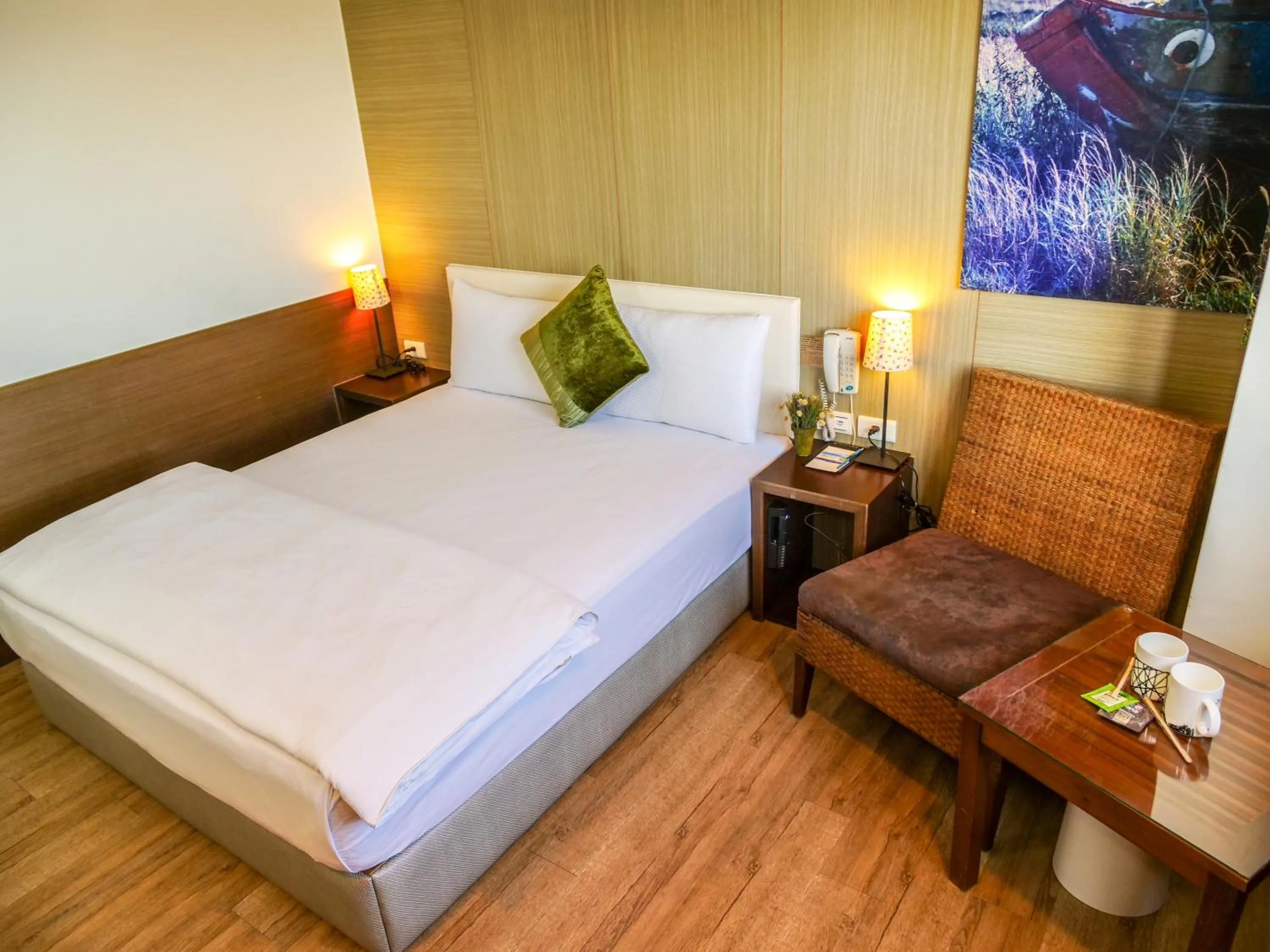 Photo of the whole room, Bed in MF Hotel, penghu