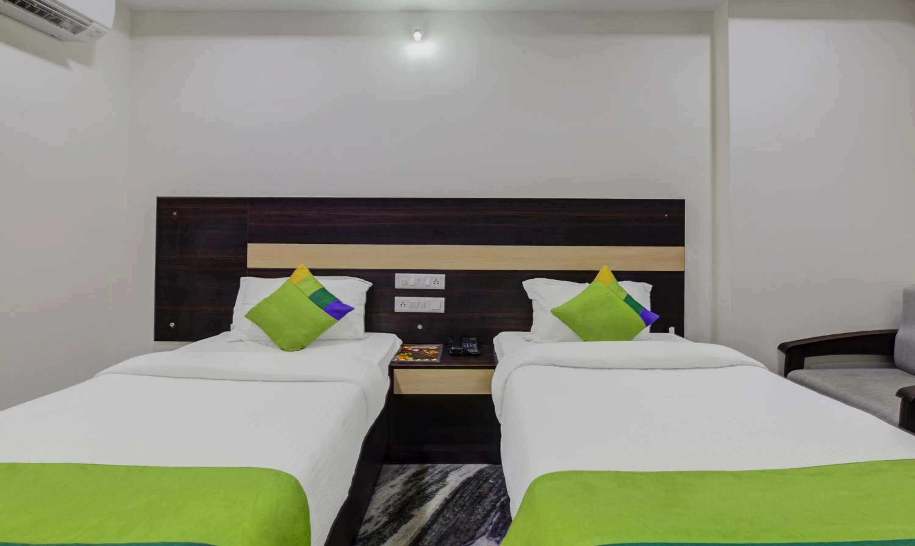 Bed in Hotel Royal Dezire Udaipur