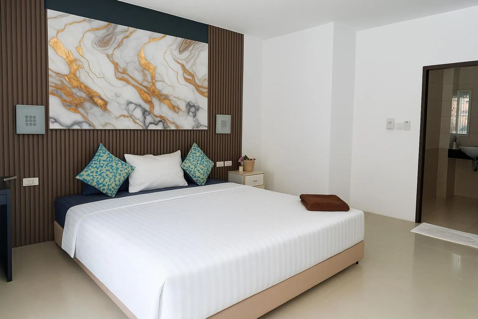 Bed in Happy Fish Guesthouse