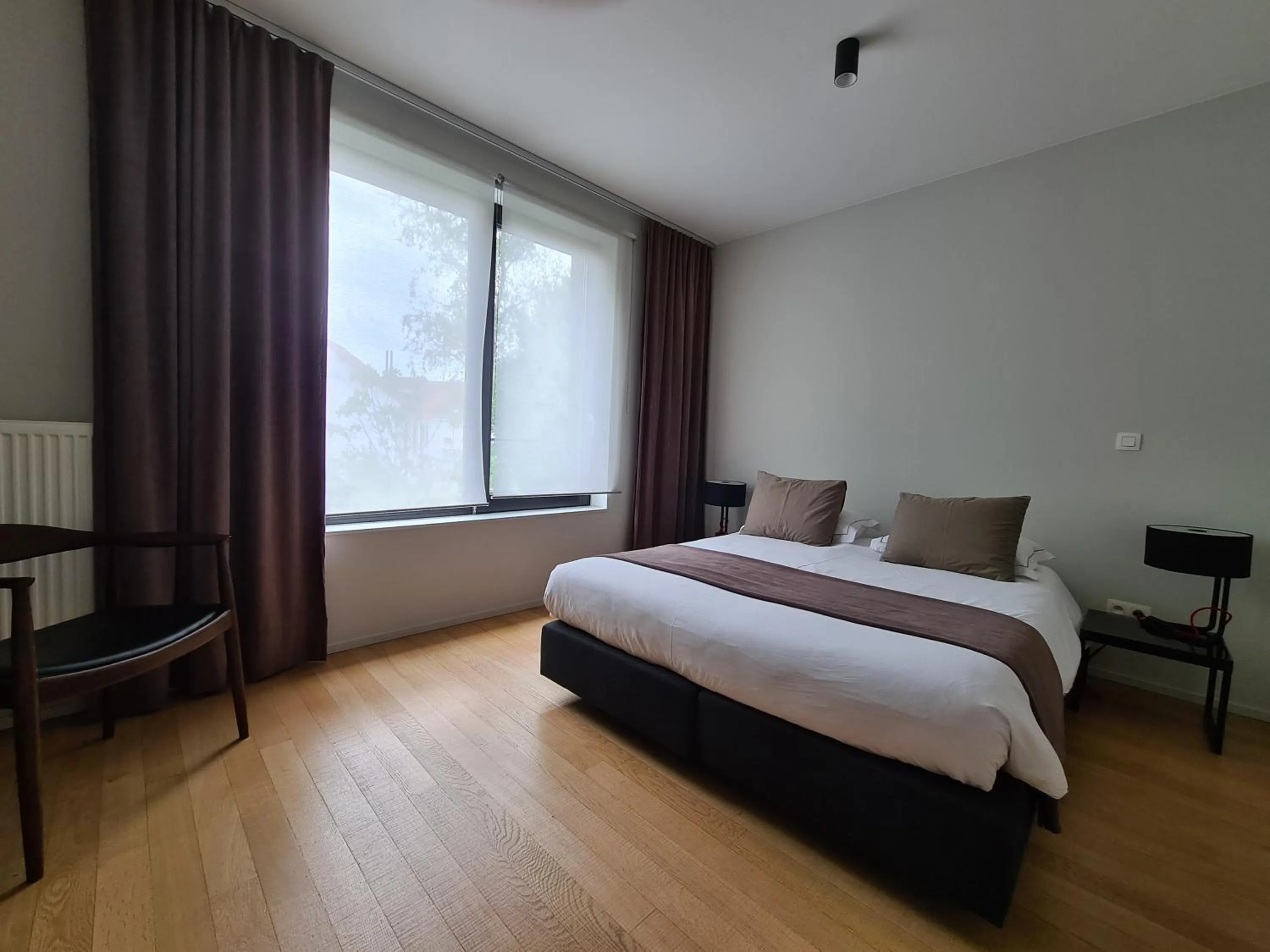 Photo of the whole room, Bed in B&B A Côté du Cinquantenaire