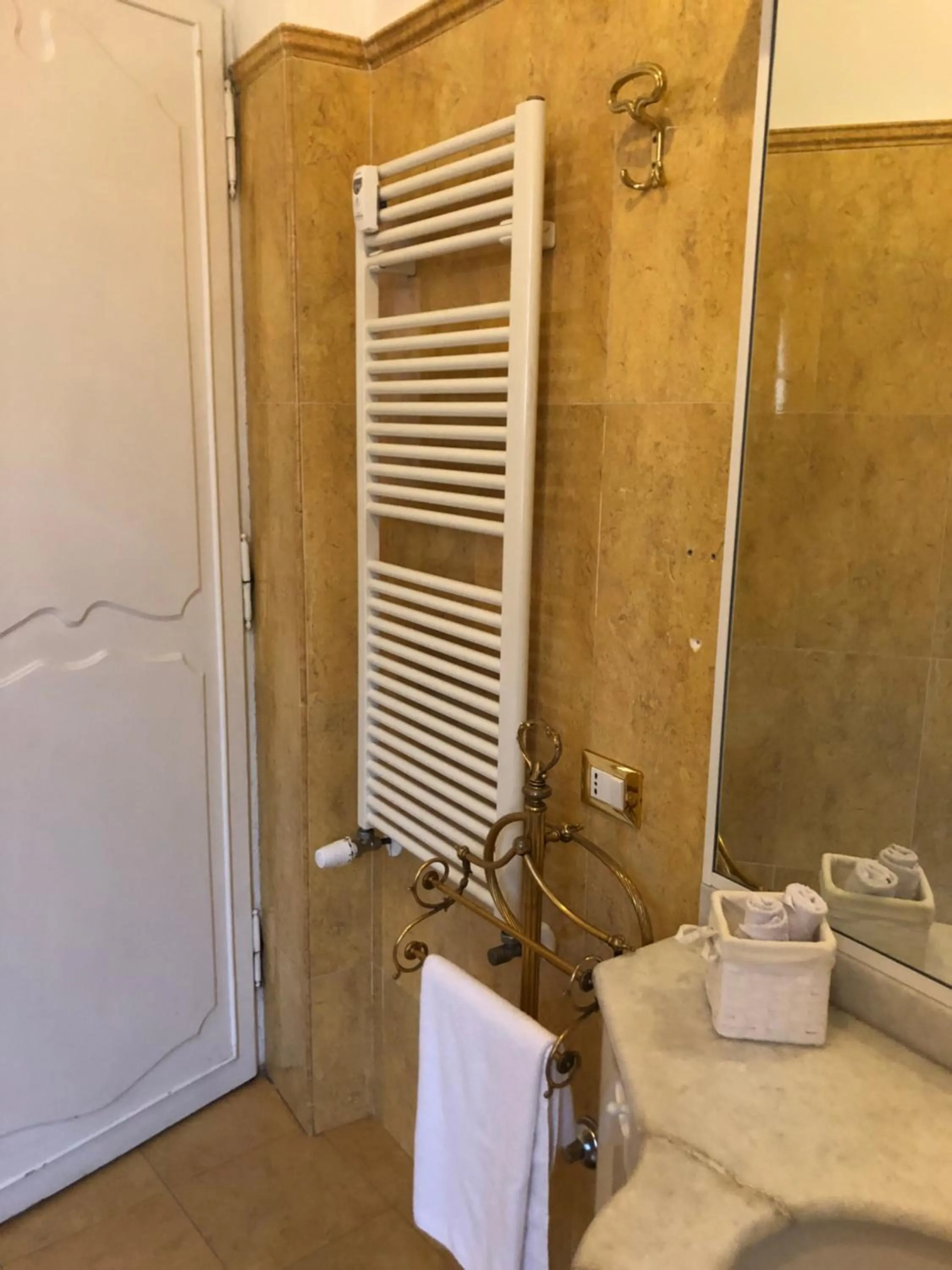 Bathroom in All Comfort Astoria Palace