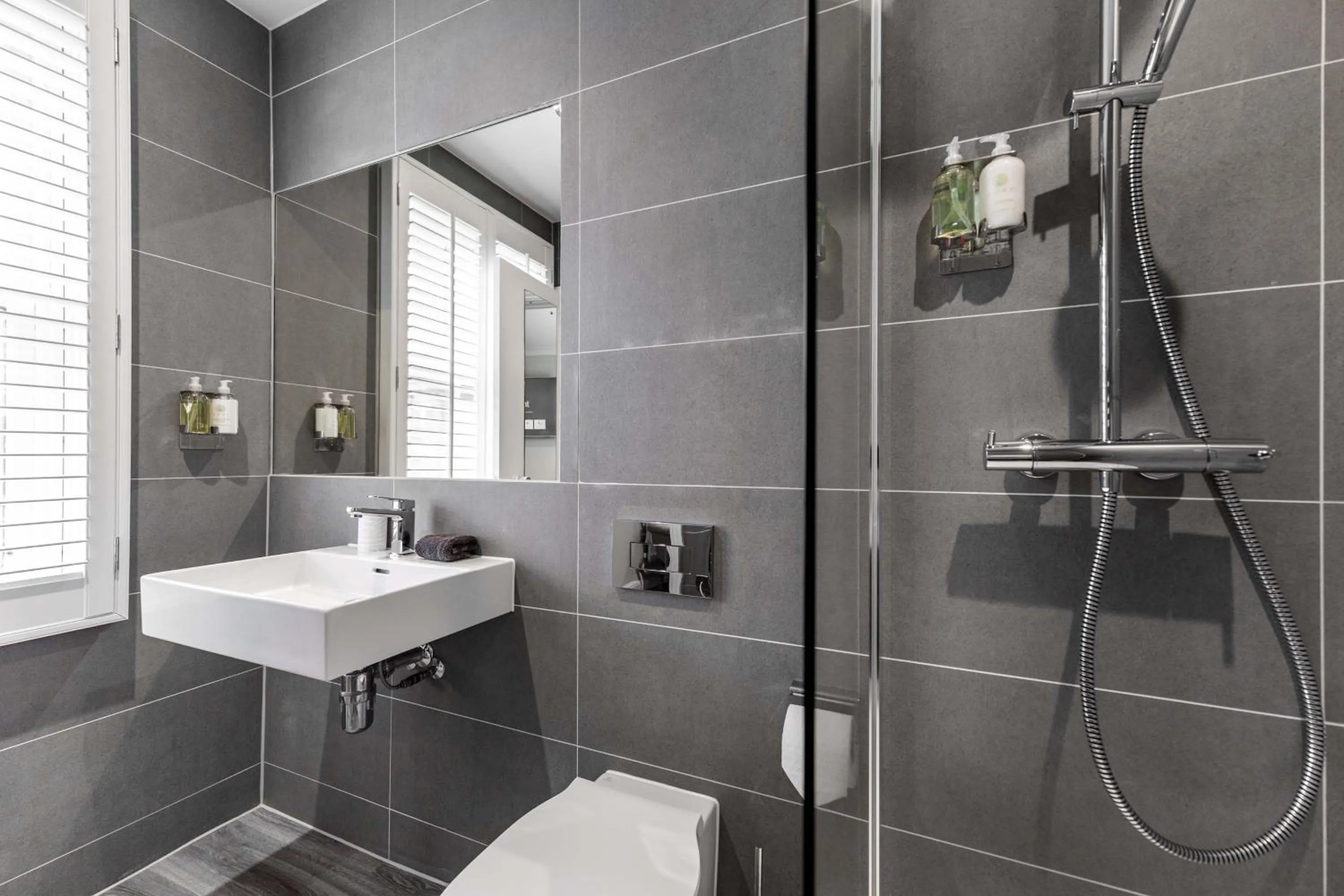 Bathroom in The Regent Aparthotel