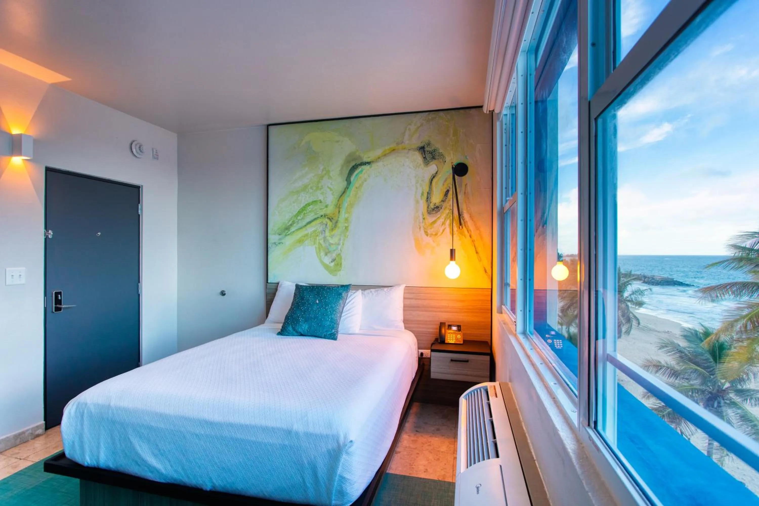 Bedroom, Bed in The Tryst Beachfront Hotel