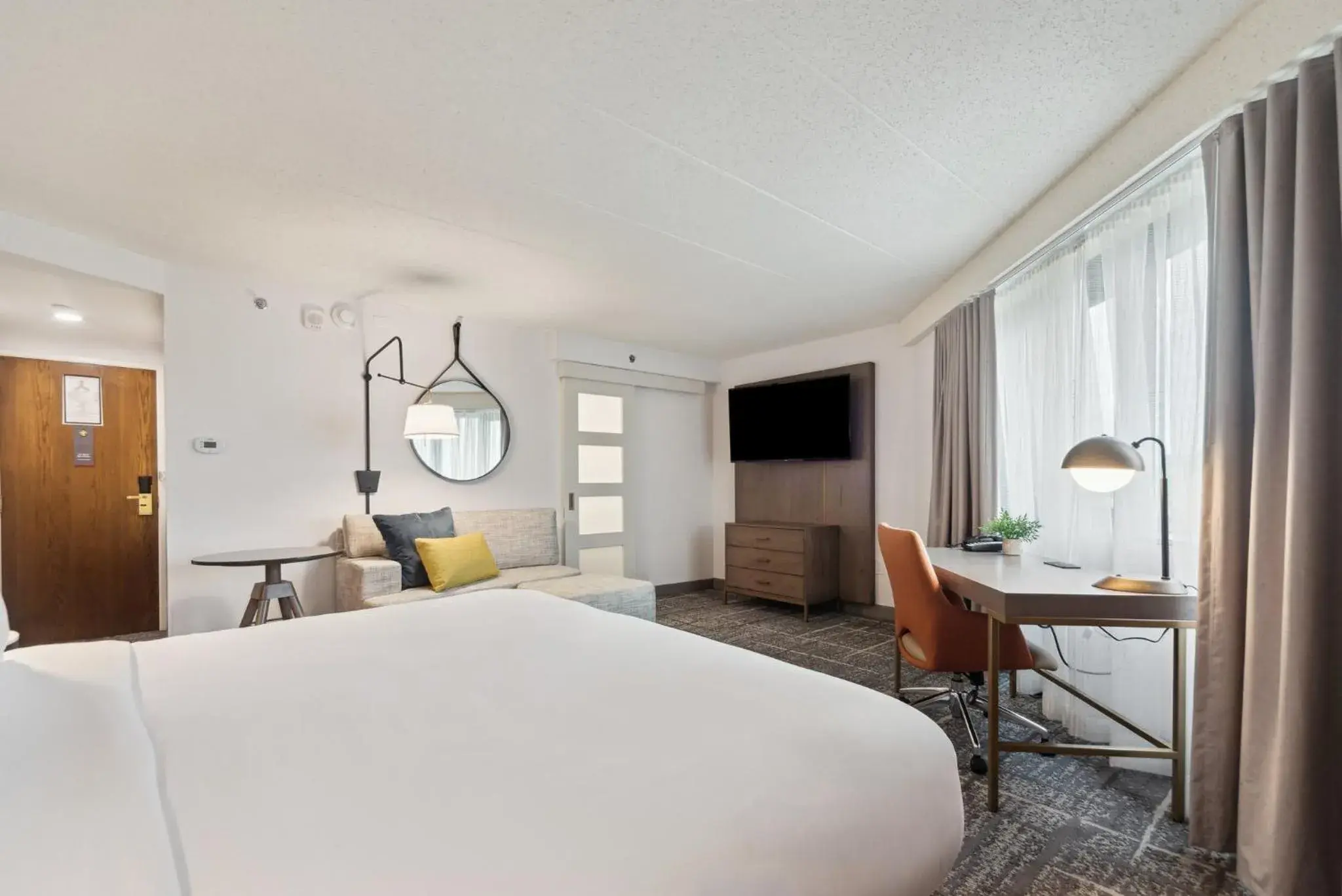 Photo of the whole room, Bed in Crowne Plaza Lansing by IHG Photo of the whole room, Bed in Crowne Plaza Lansing by IHG