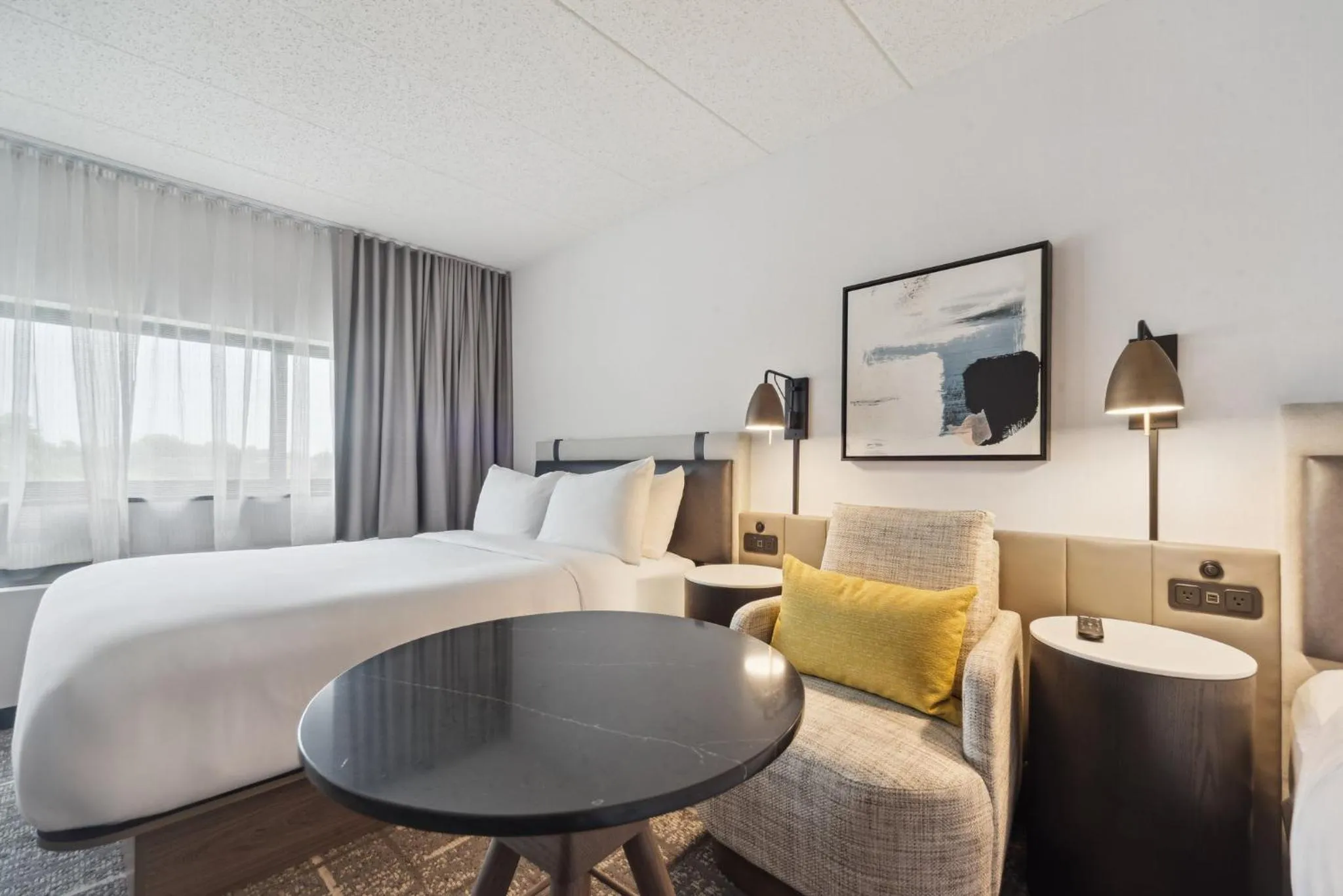 Photo of the whole room, Bed in Crowne Plaza Lansing by IHG