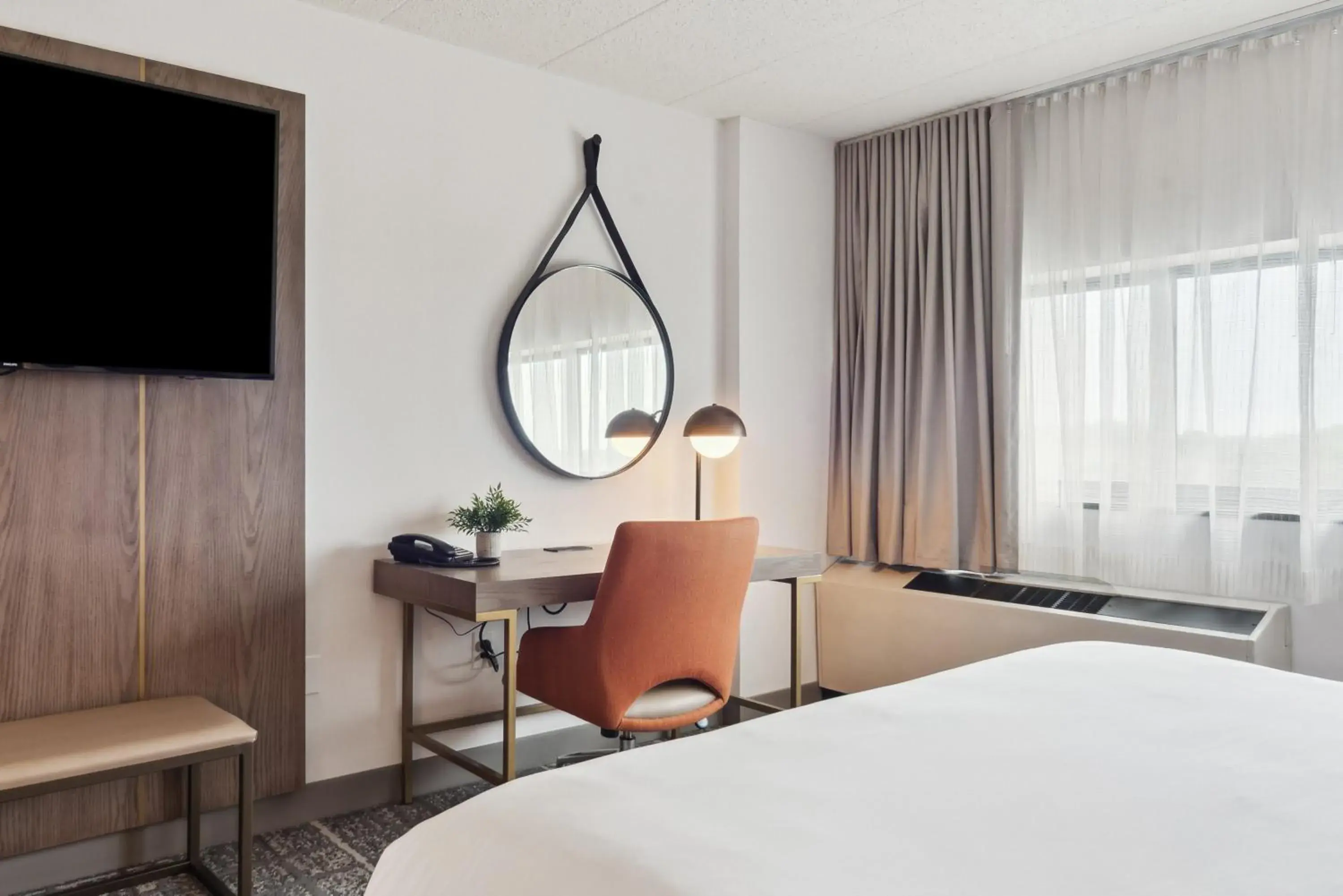 Photo of the whole room, Bed in Crowne Plaza Lansing by IHG Photo of the whole room, Bed in Crowne Plaza Lansing by IHG