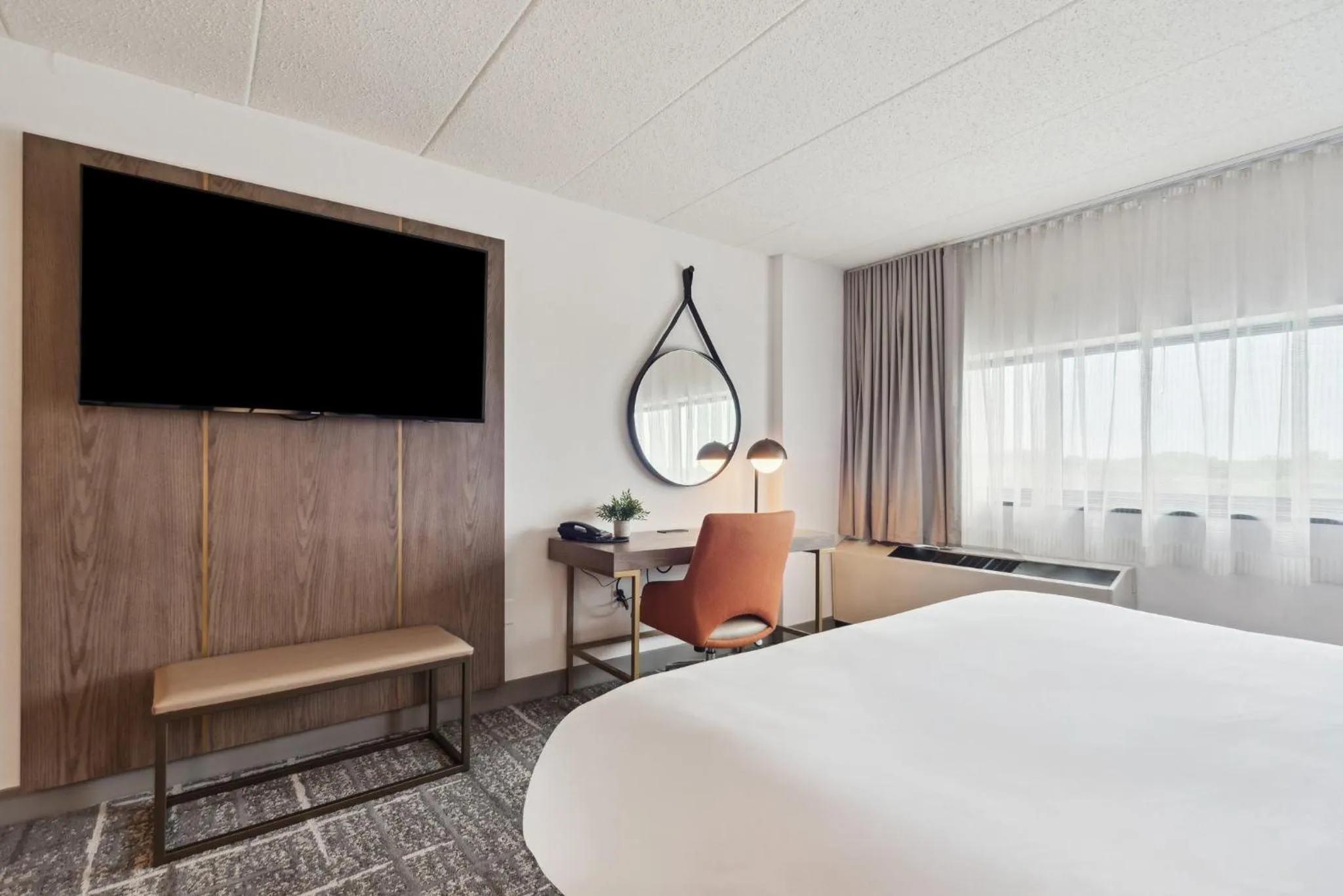 Photo of the whole room, Bed in Crowne Plaza Lansing by IHG