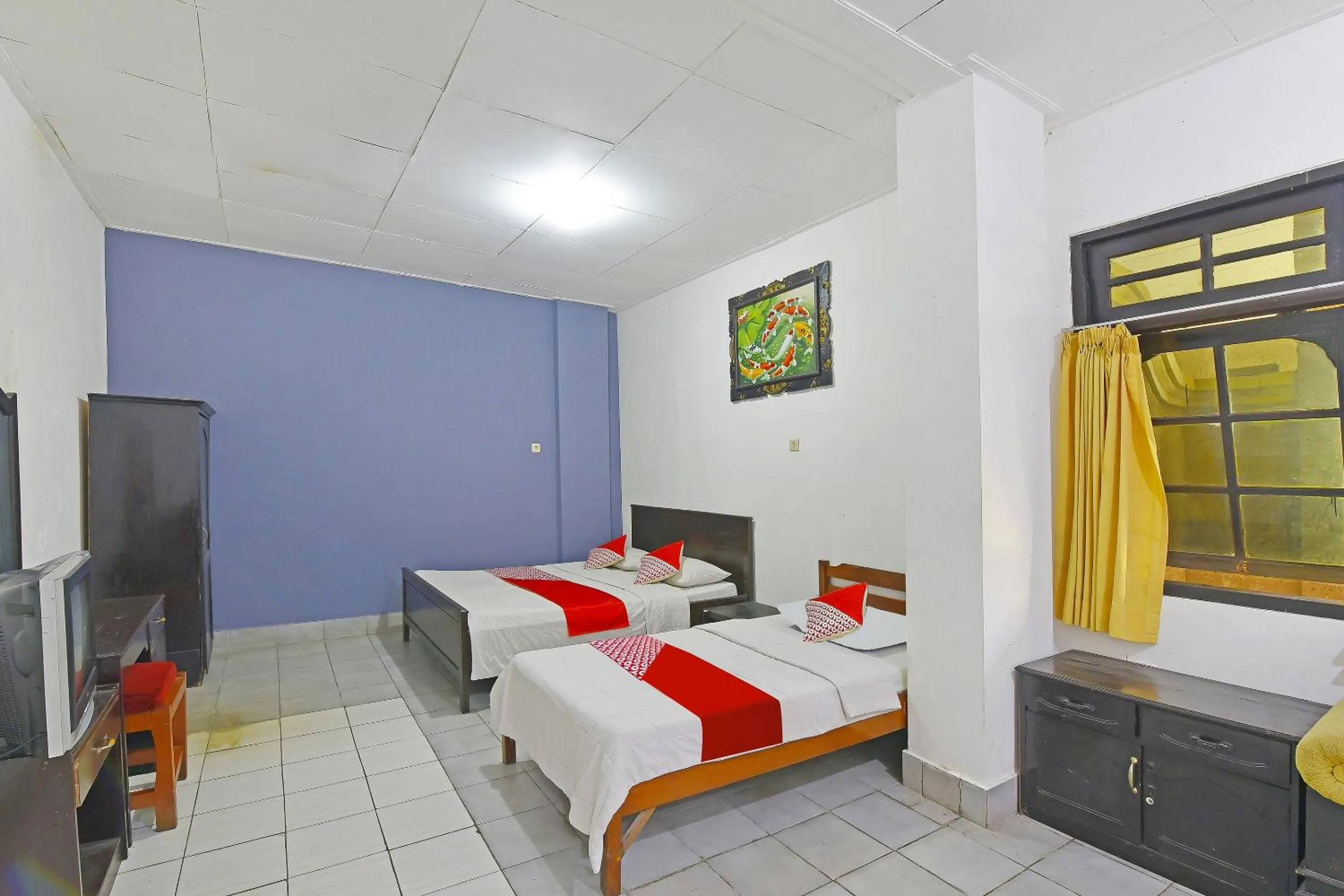 Bedroom in OYO 3244 Grand Chandra Hotel