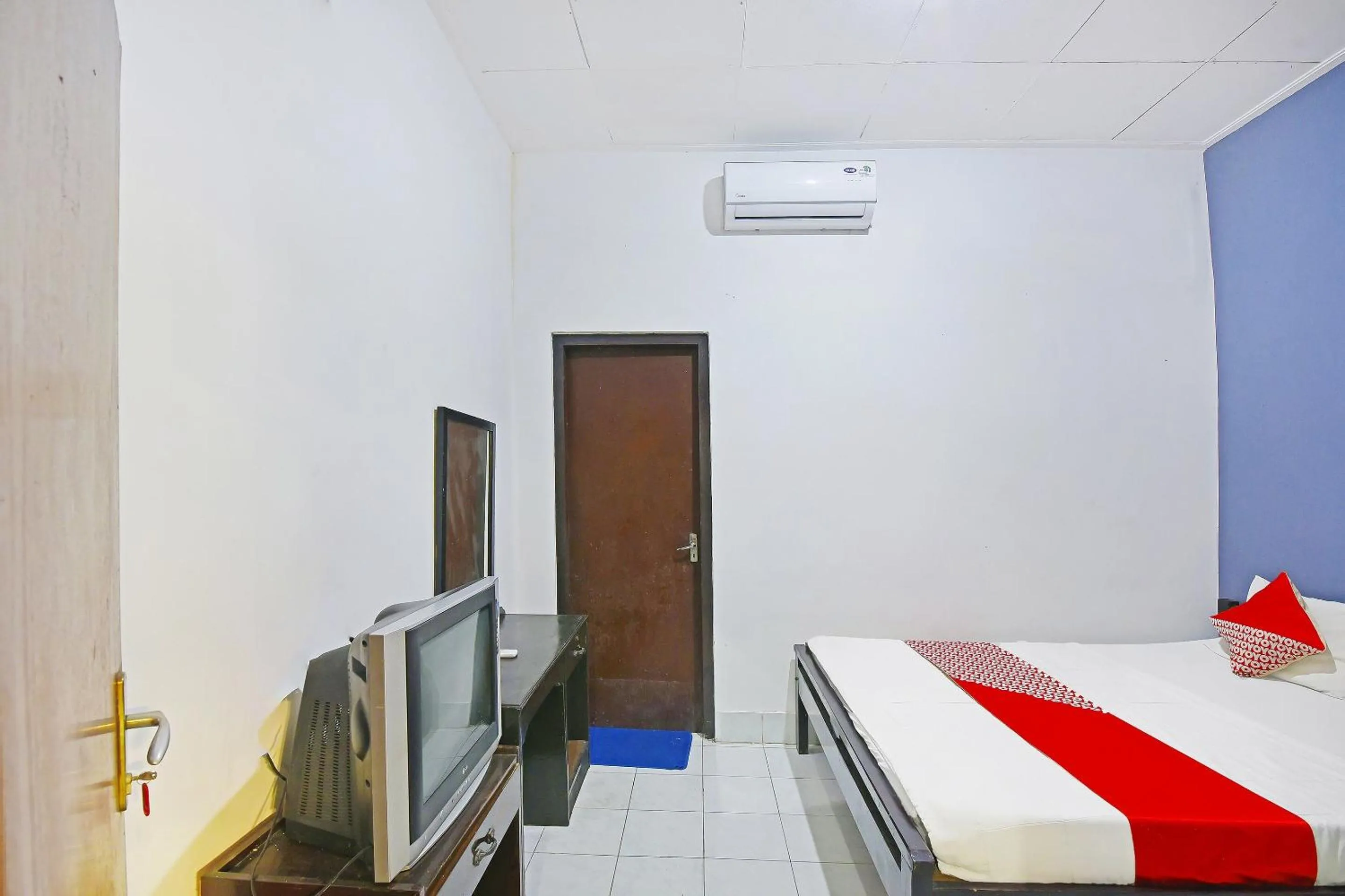 Bedroom in OYO 3244 Grand Chandra Hotel