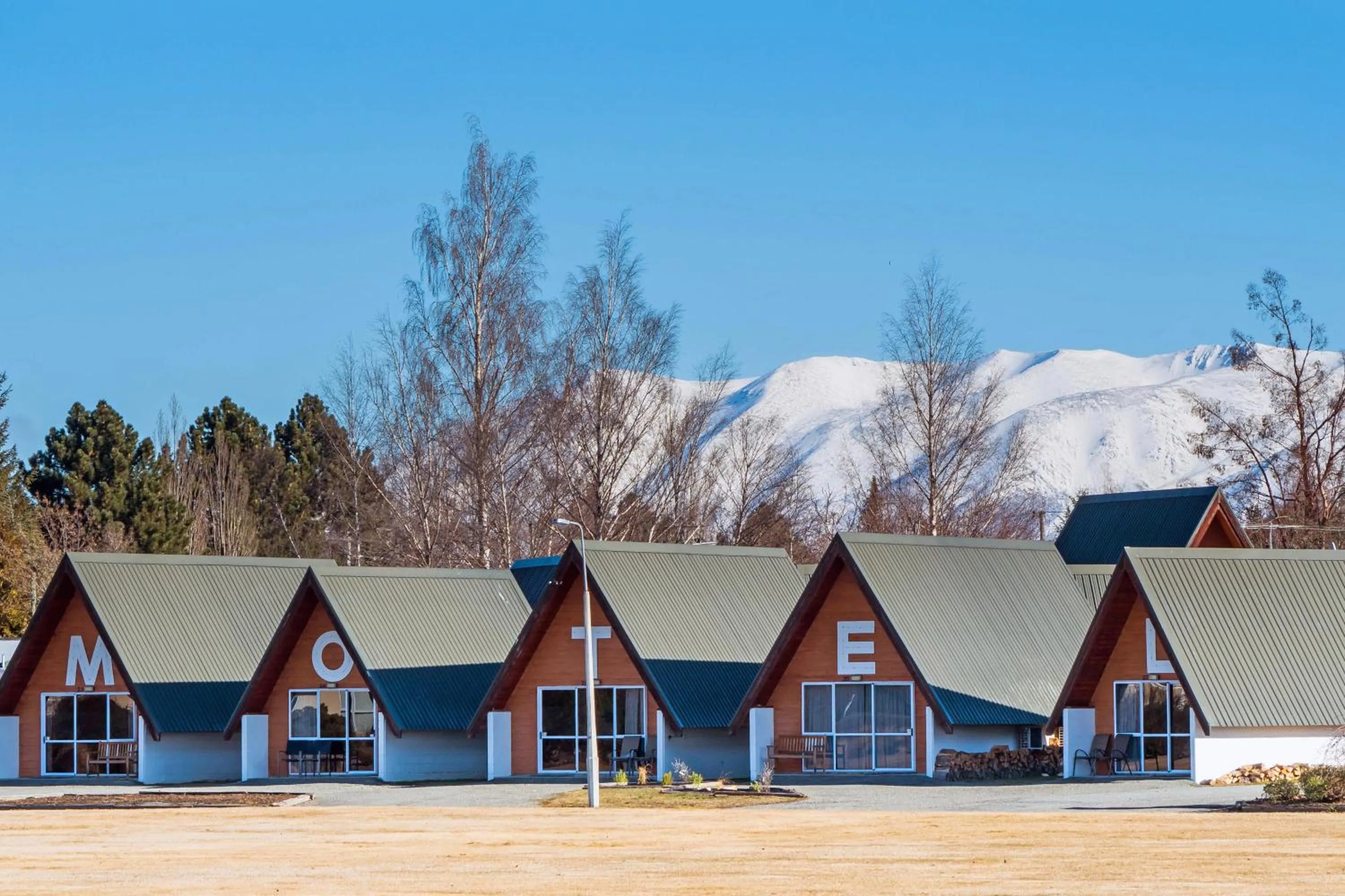 Facade/entrance in Mountain Chalets Motel