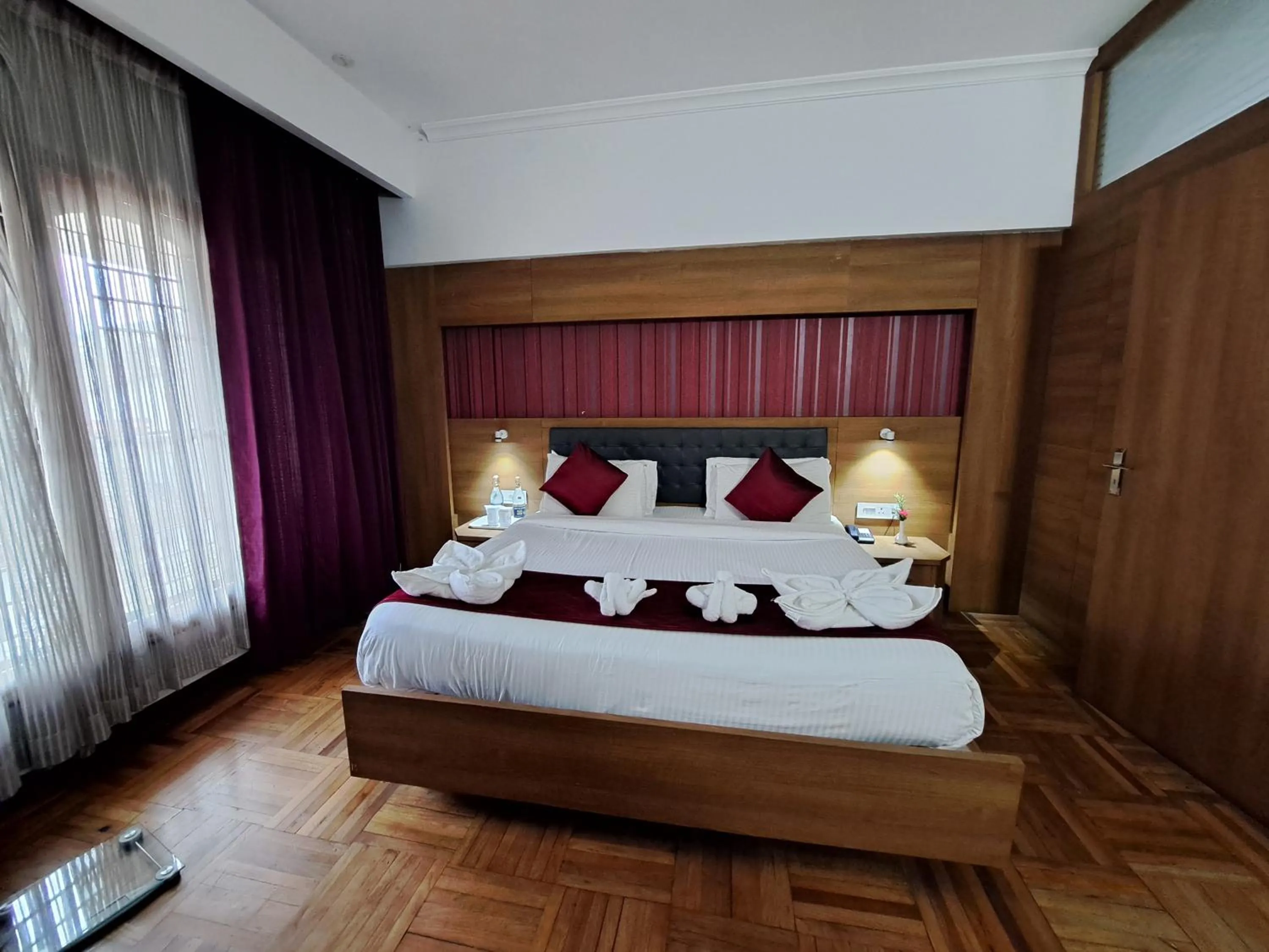 Bed in Hotel Preethi Classic Towers