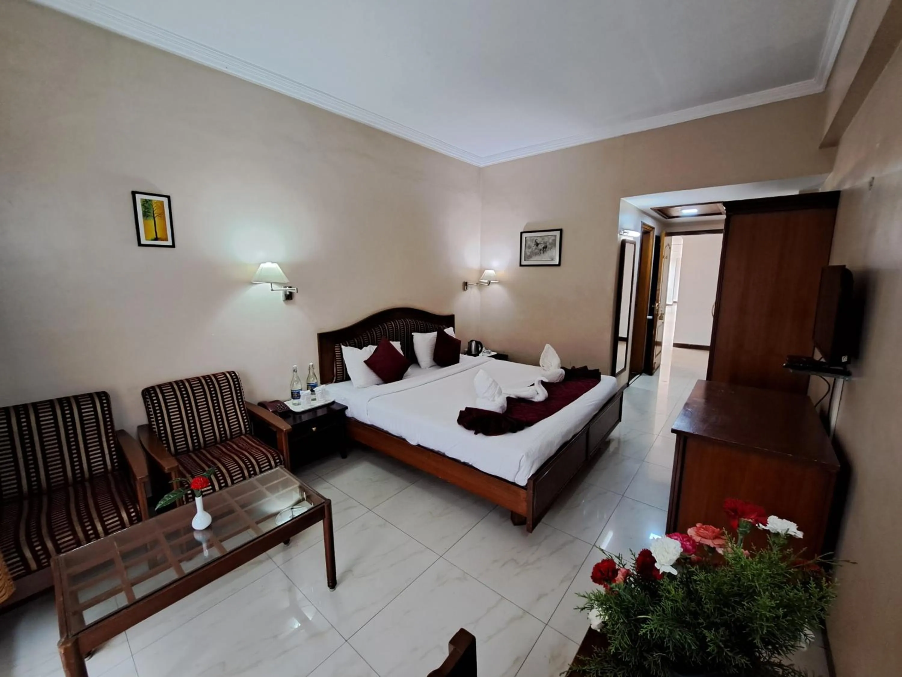 Bed in Hotel Preethi Classic Towers