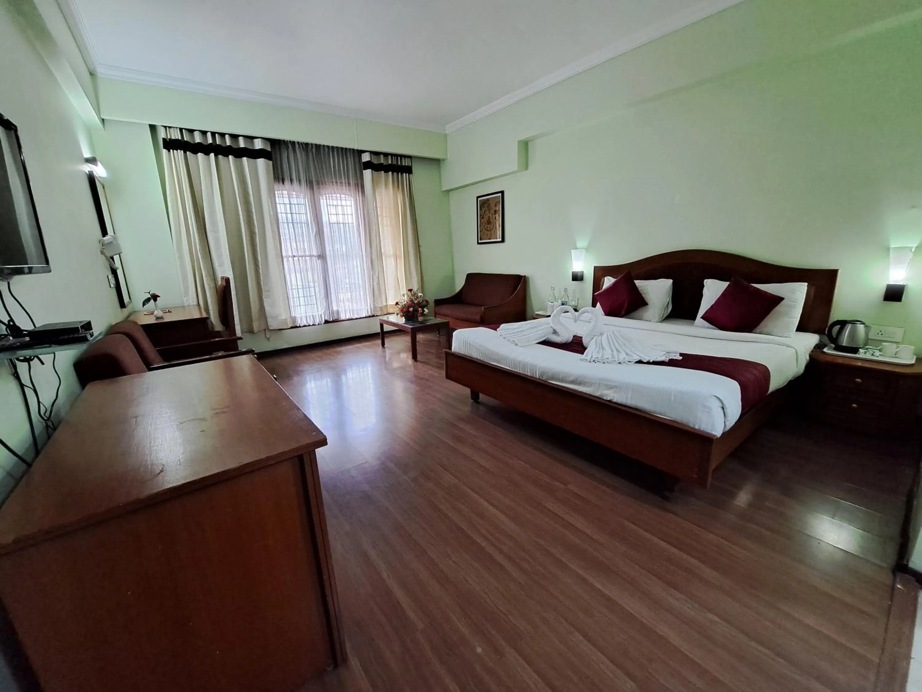 Bed in Hotel Preethi Classic Towers