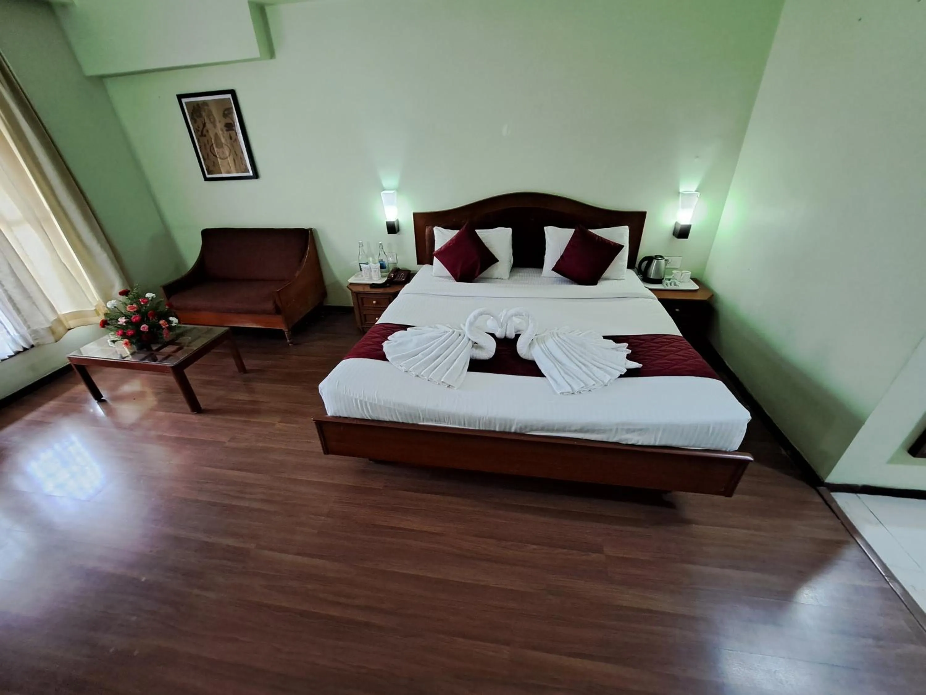 Bed in Hotel Preethi Classic Towers