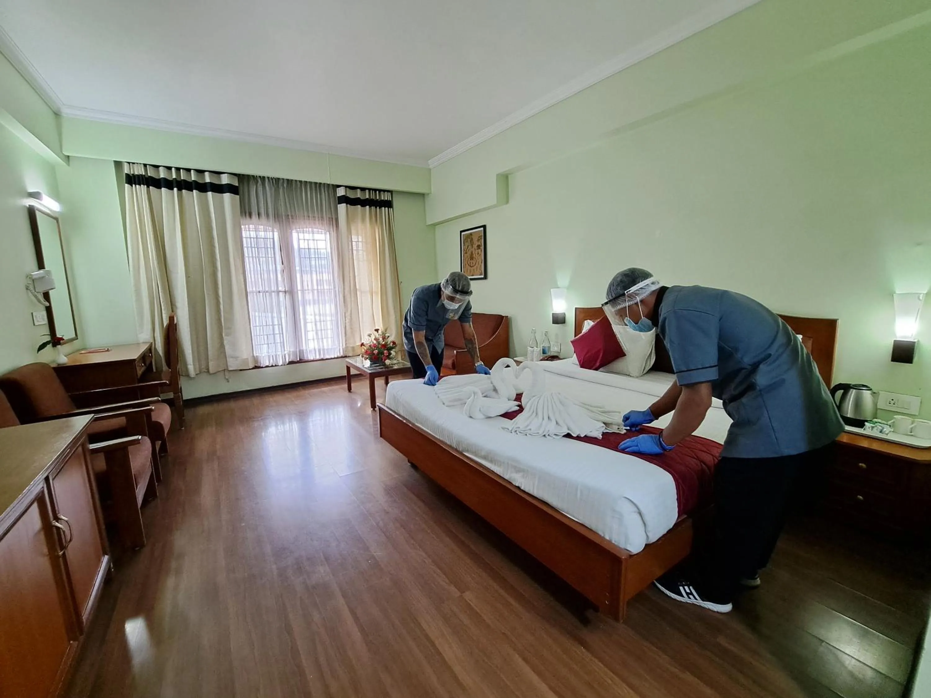 Bed in Hotel Preethi Classic Towers