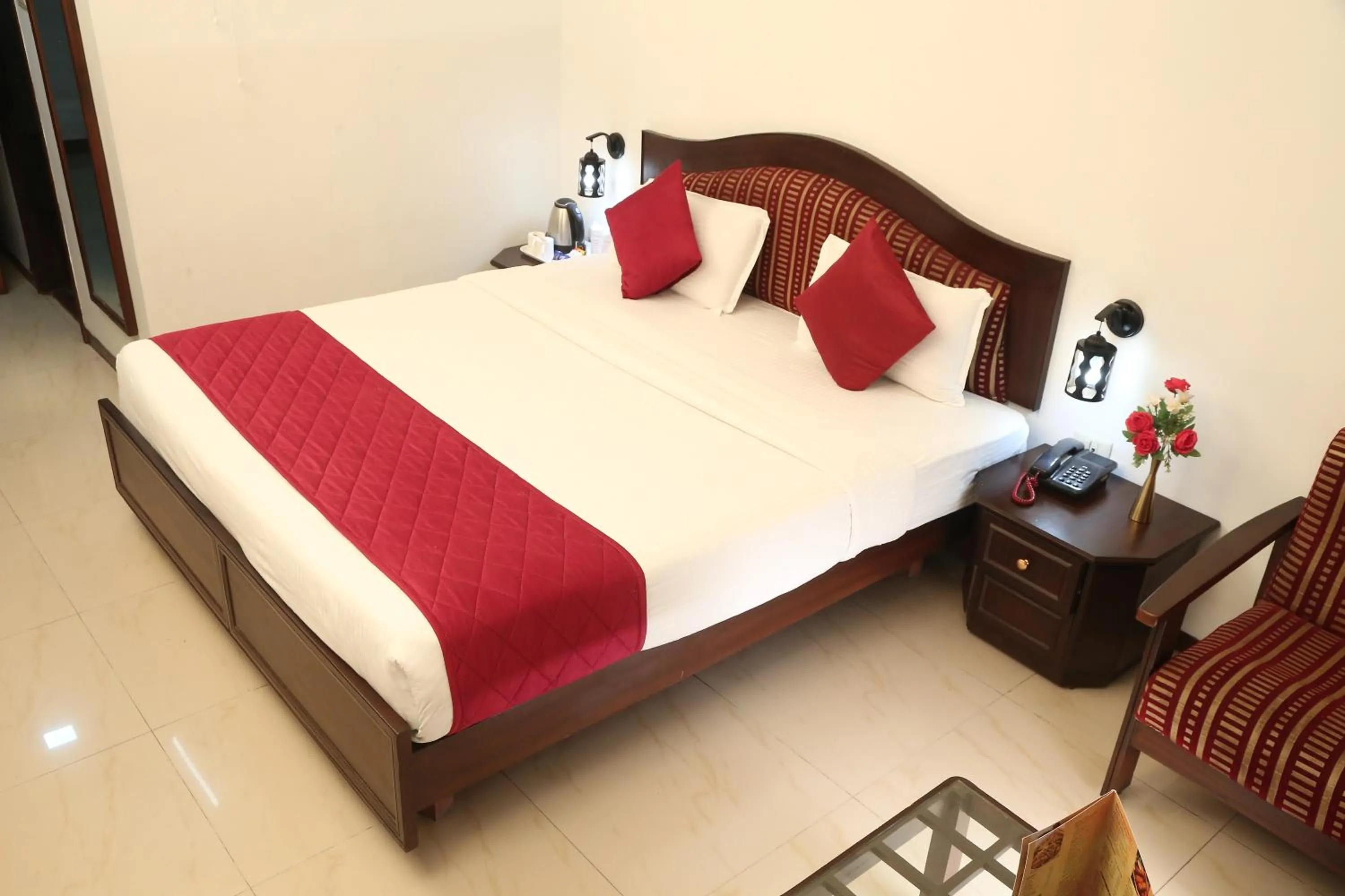 Bed in Hotel Preethi Classic Towers