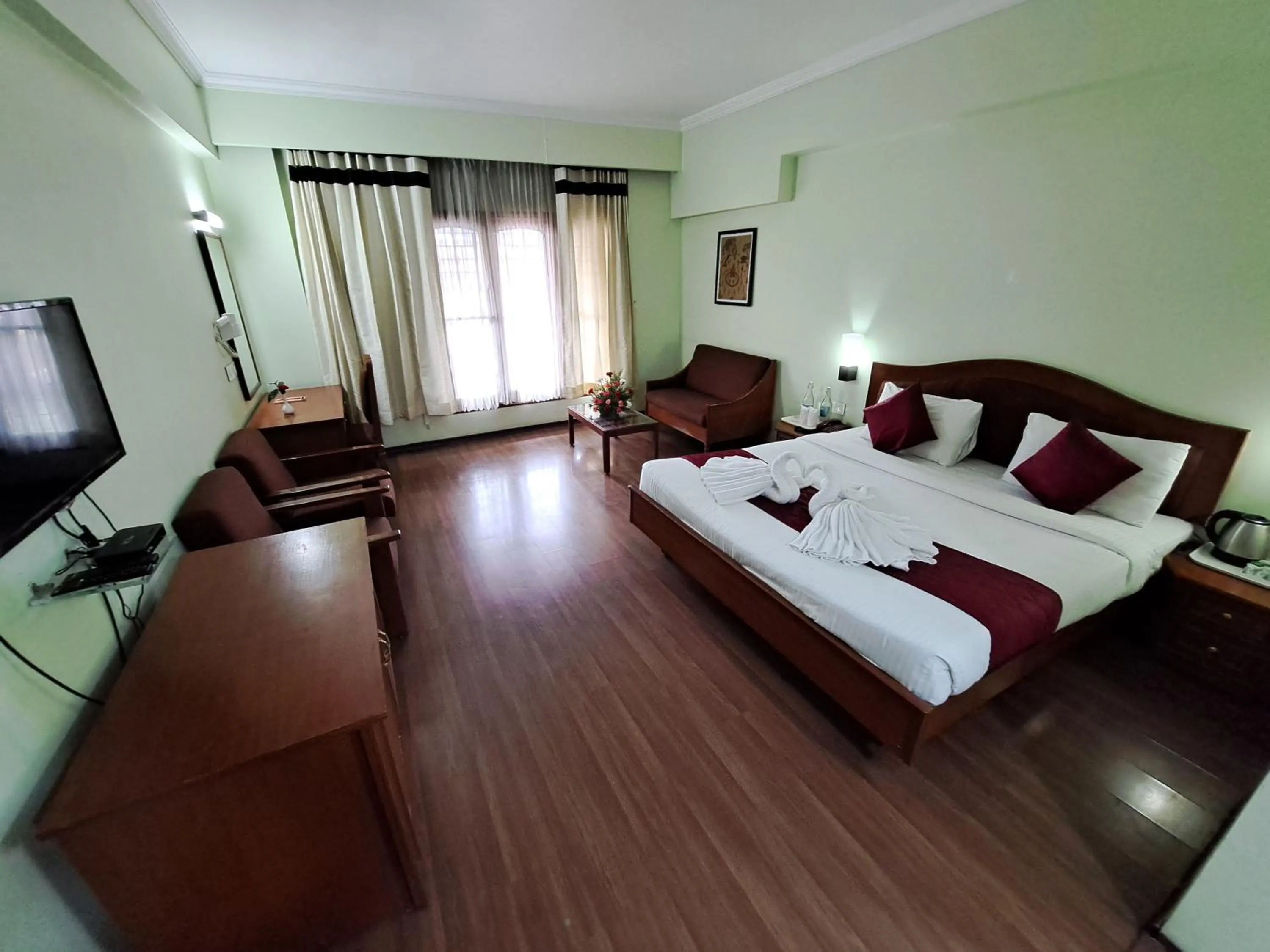 Bed in Hotel Preethi Classic Towers