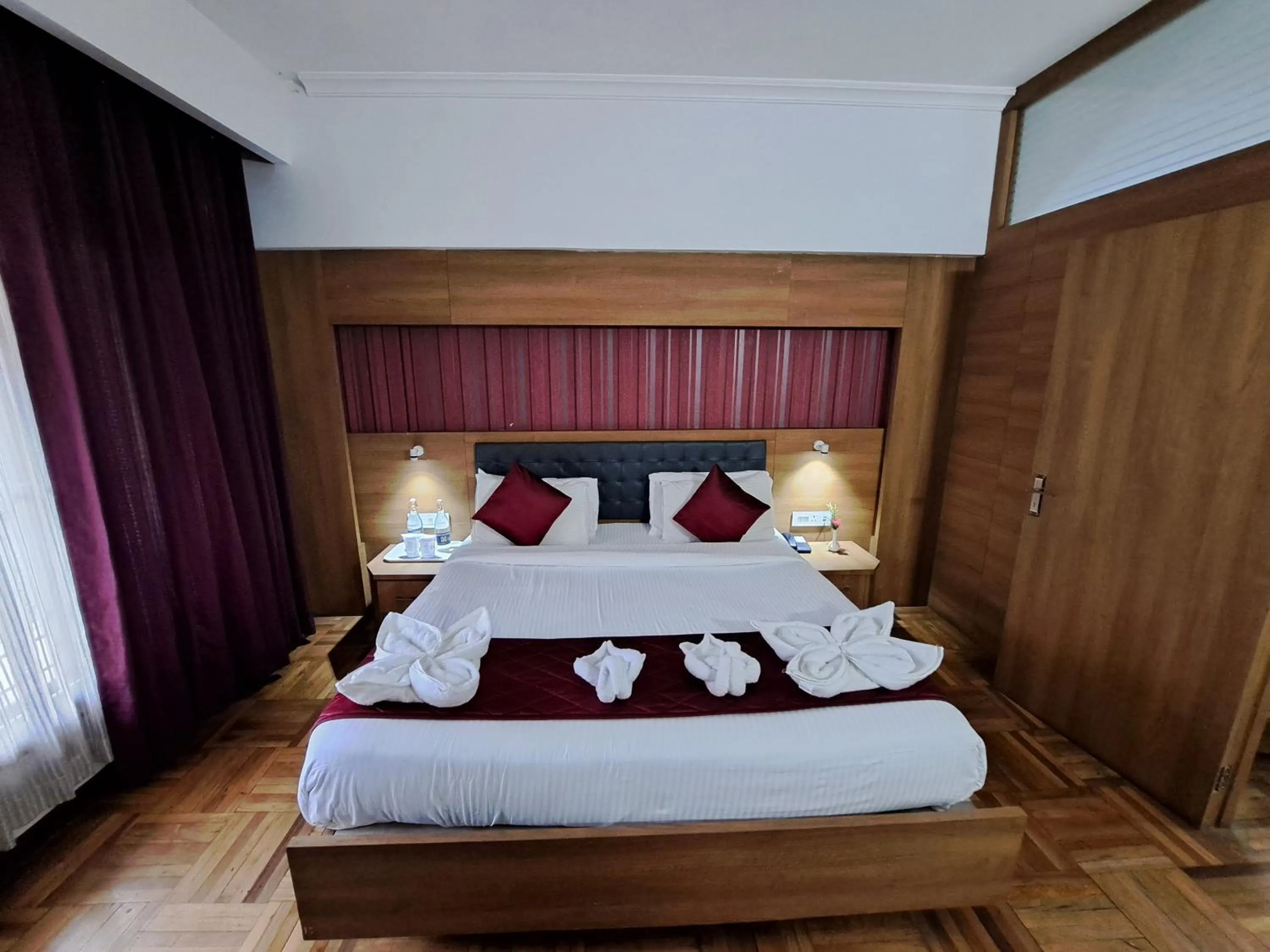 Bed in Hotel Preethi Classic Towers