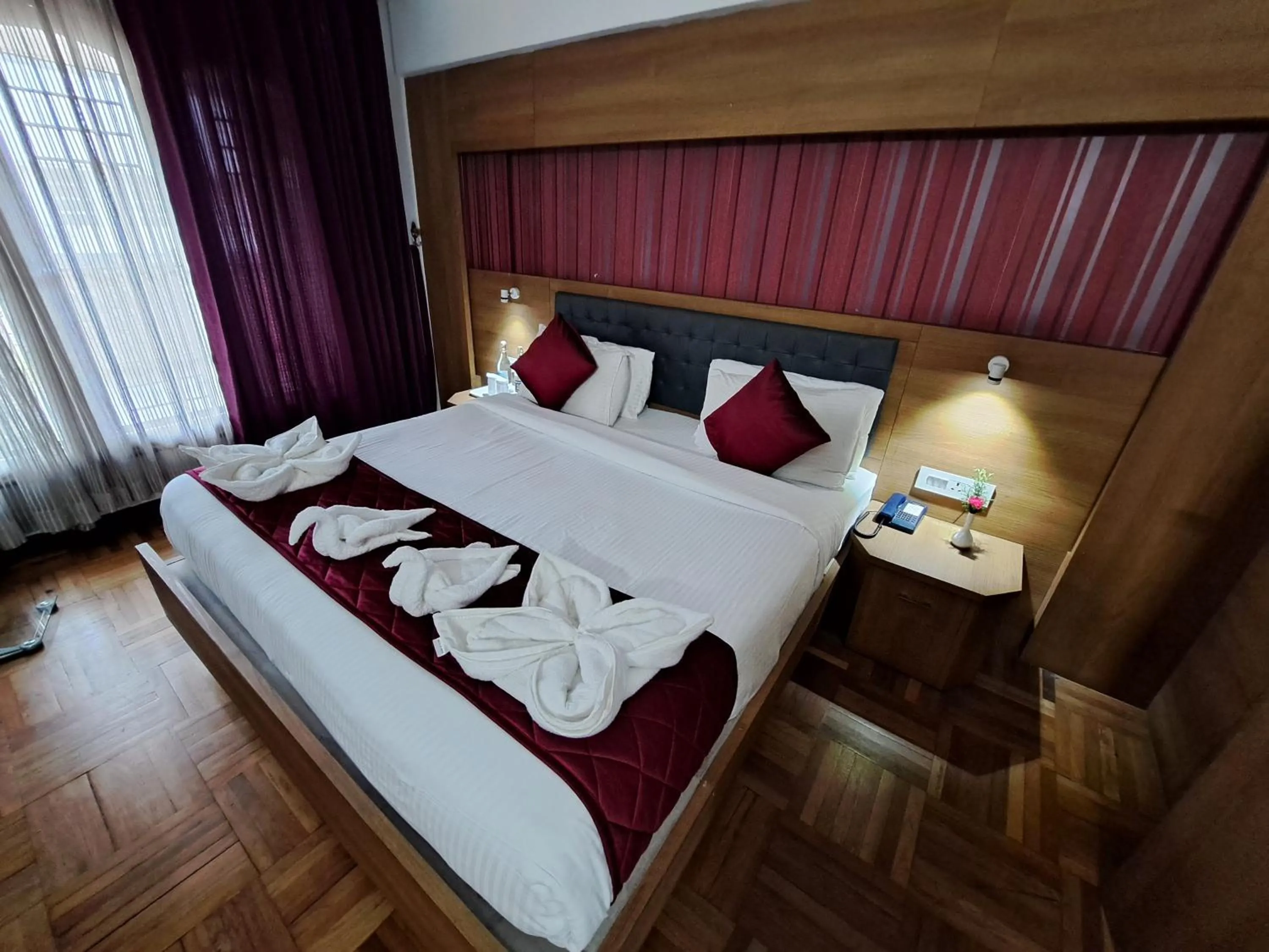 Bed in Hotel Preethi Classic Towers