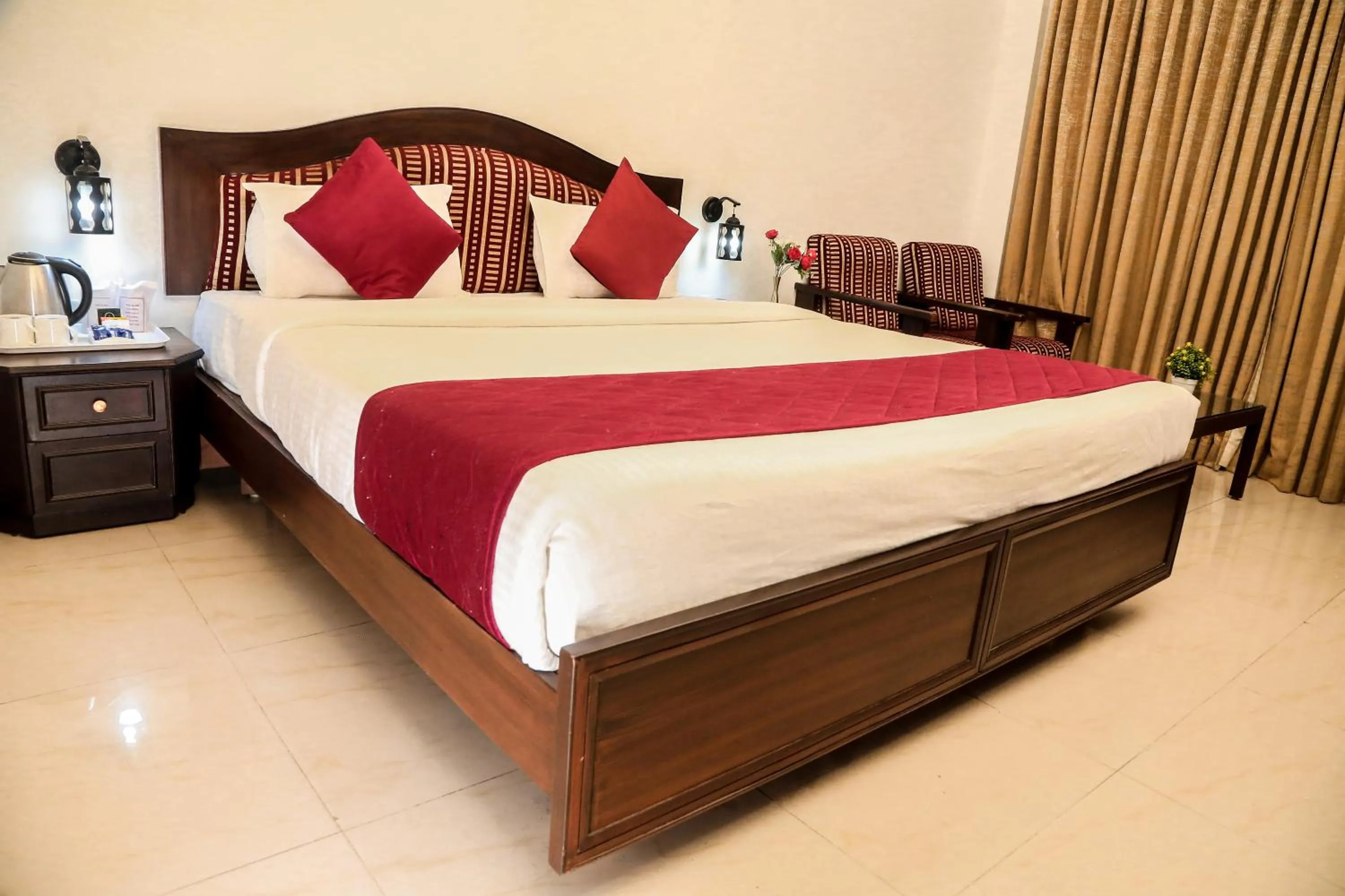 Bed in Hotel Preethi Classic Towers