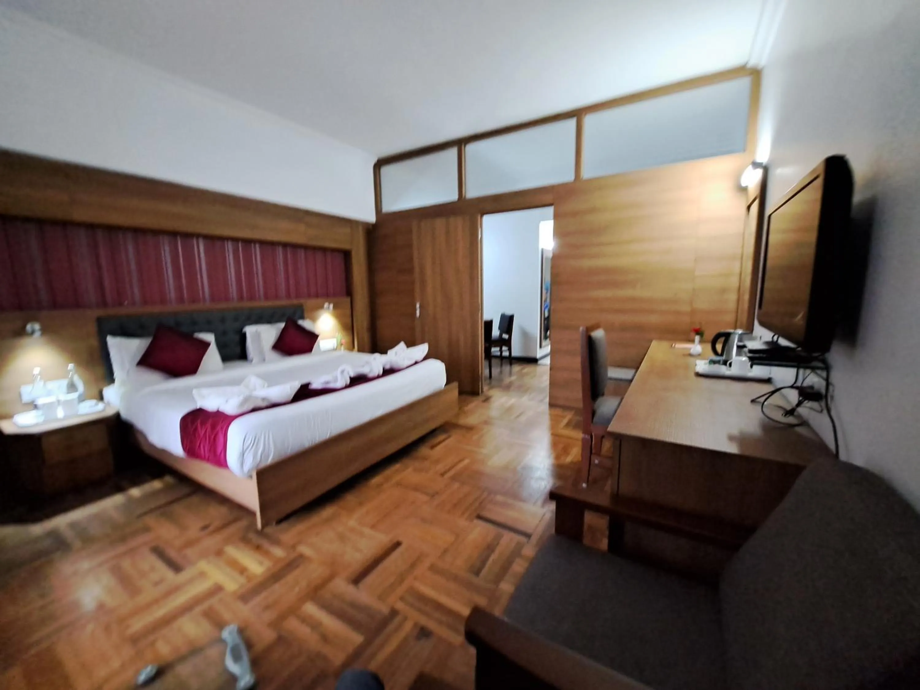 Bed in Hotel Preethi Classic Towers