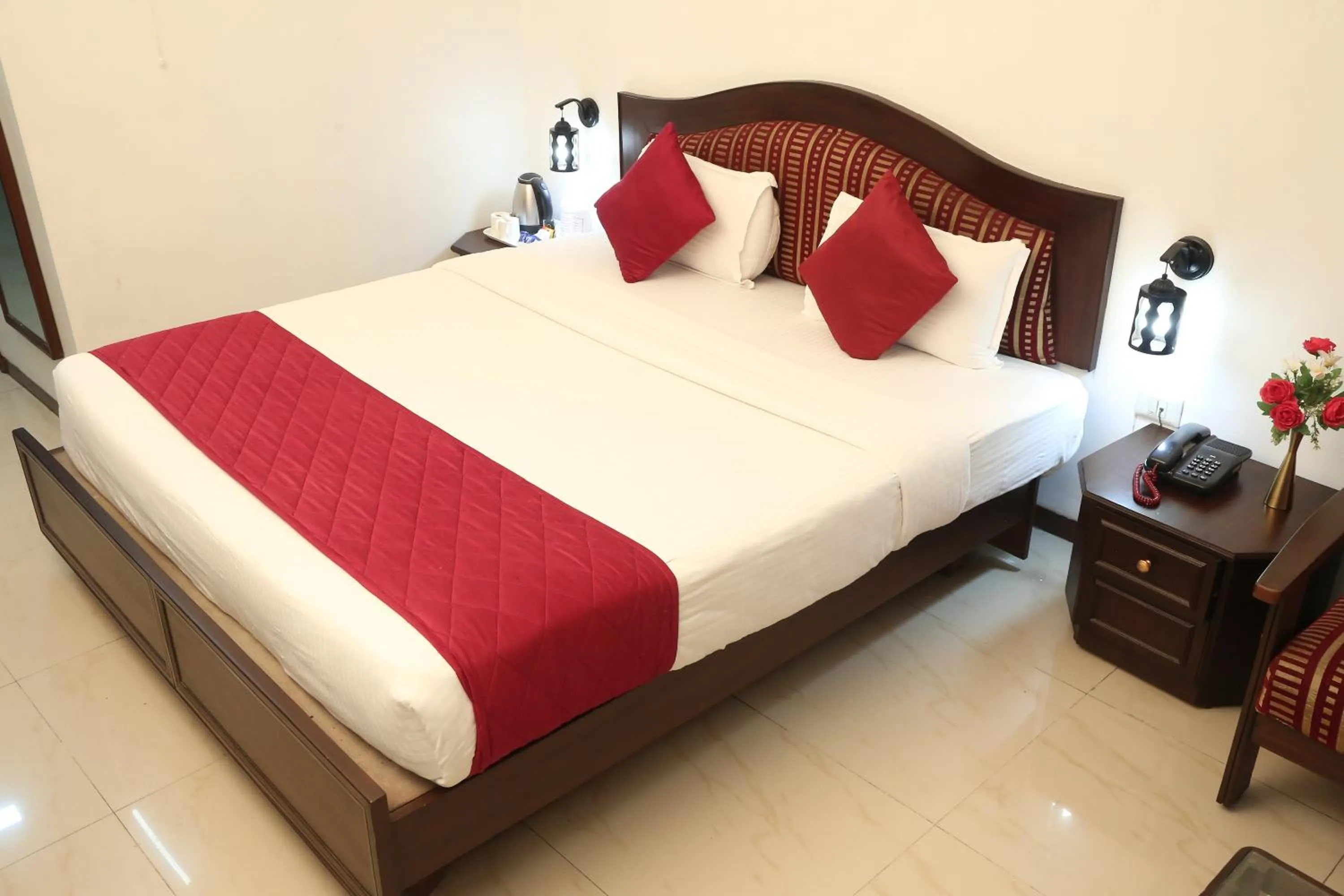 Bedroom, Bed in Hotel Preethi Classic Towers