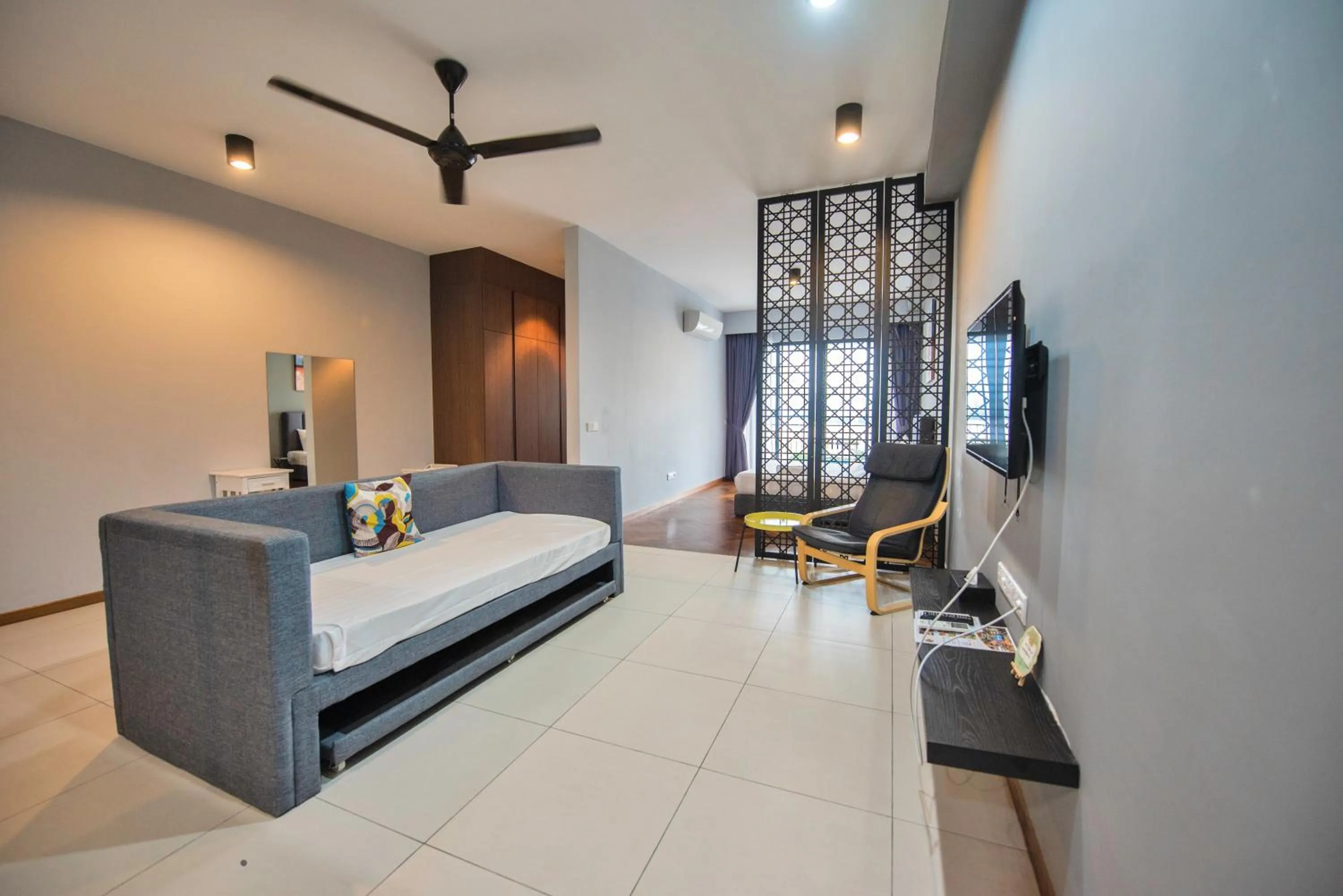 Living room, Bed in The Landmark by Katana