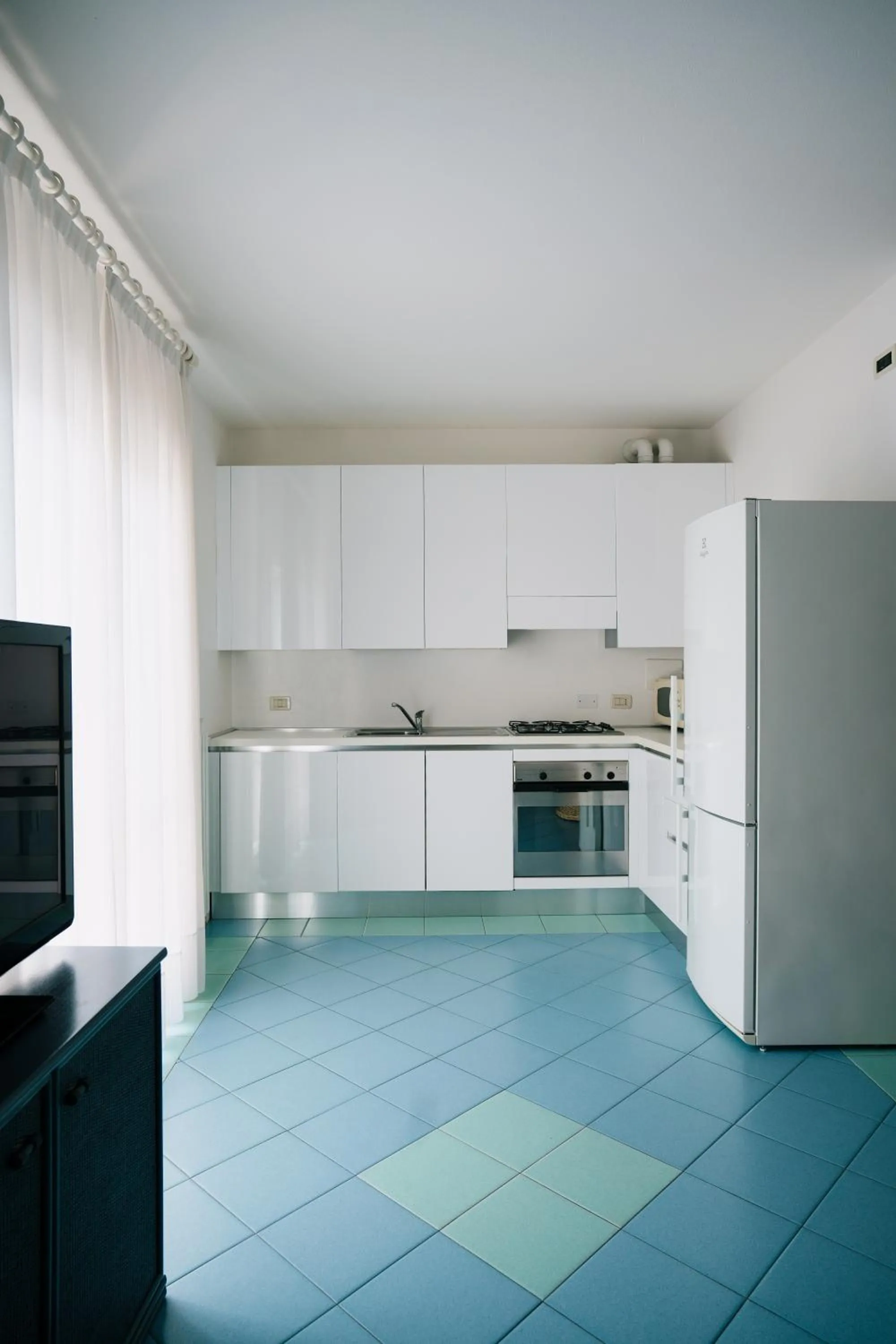 Kitchen or kitchenette in Villa Carlotta Jesolo Lido