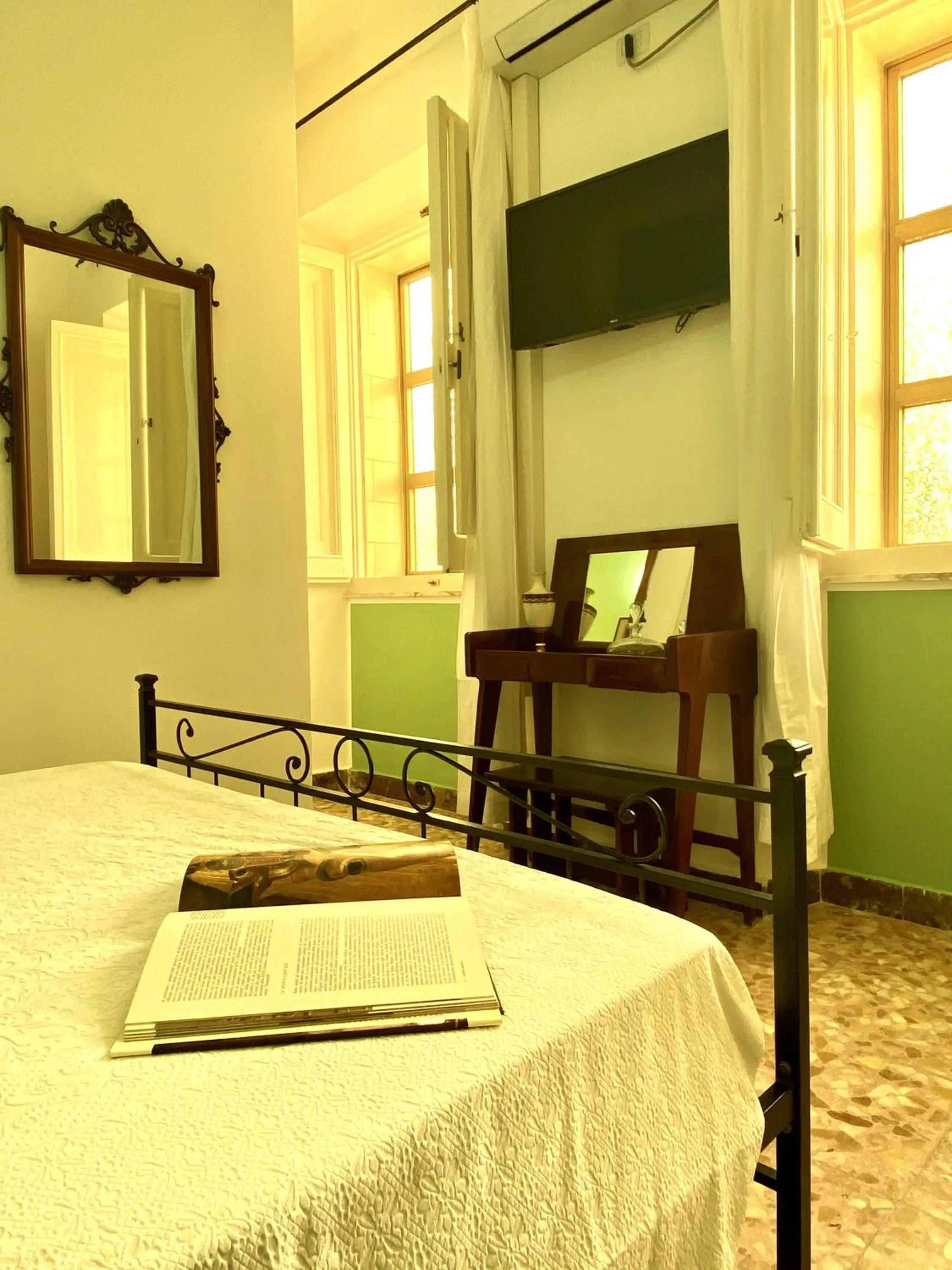 Bed in Villa Rocco Rooms