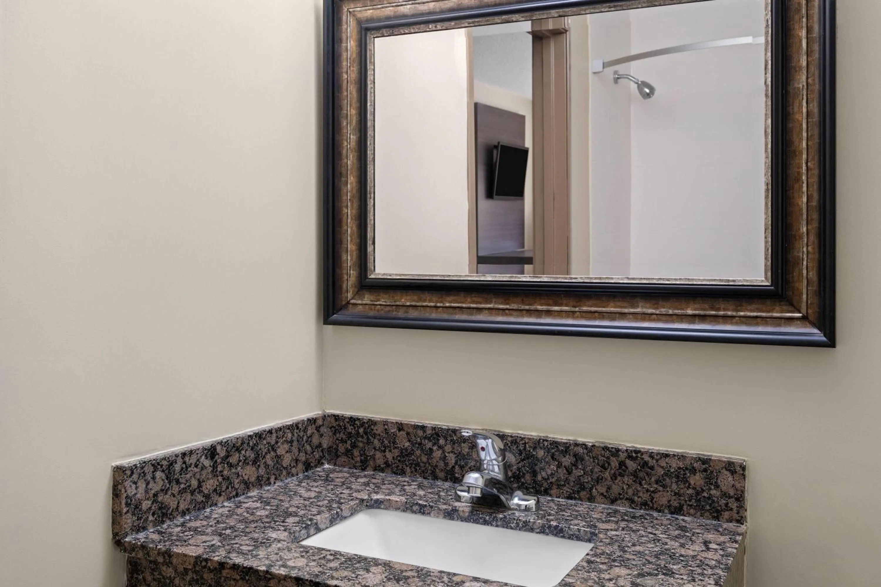 Bathroom in Super 8 by Wyndham Hagerstown I-70