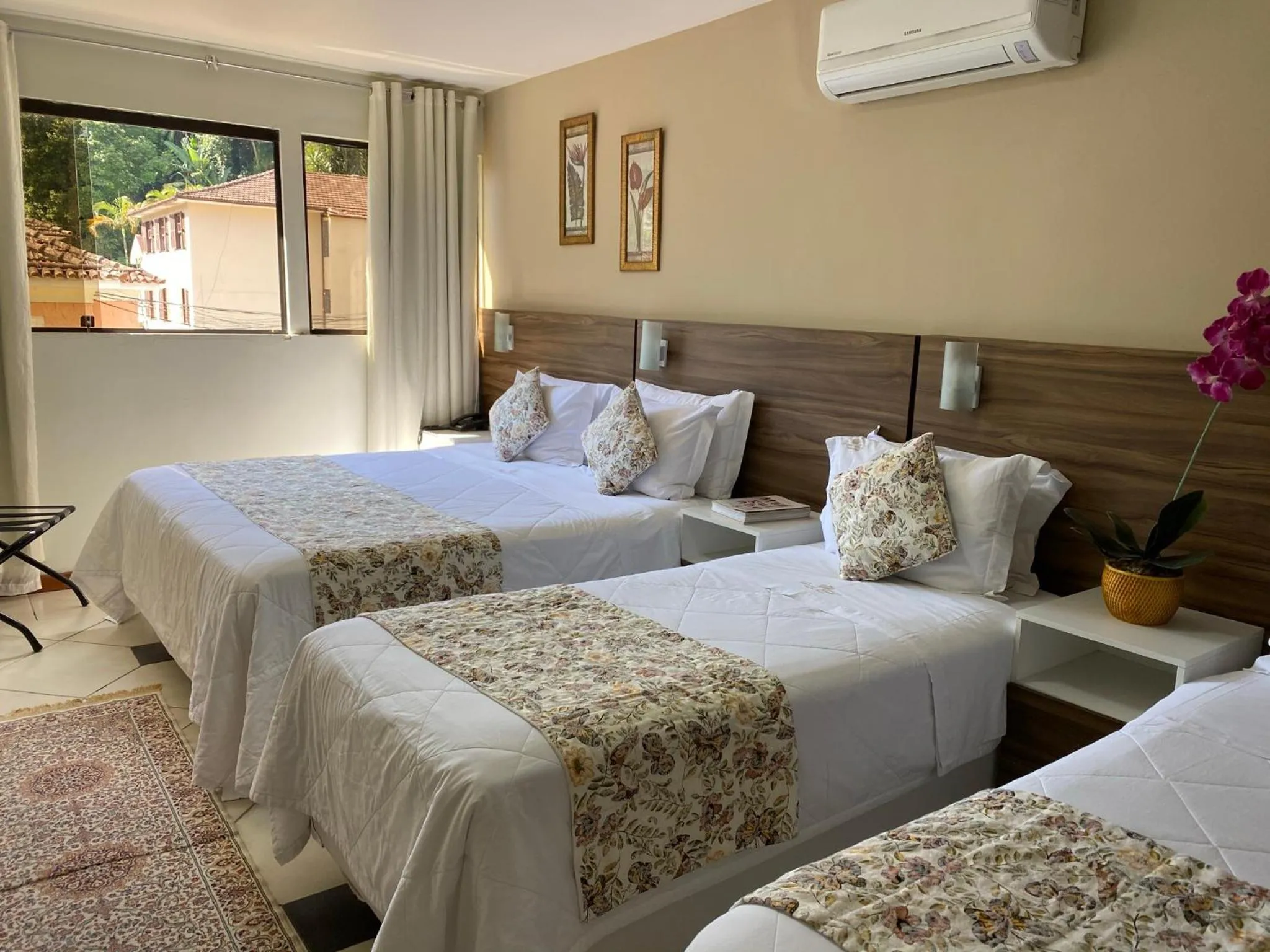 Bed in Princesa Isabel Pousada e Hotel – Dom Pedro