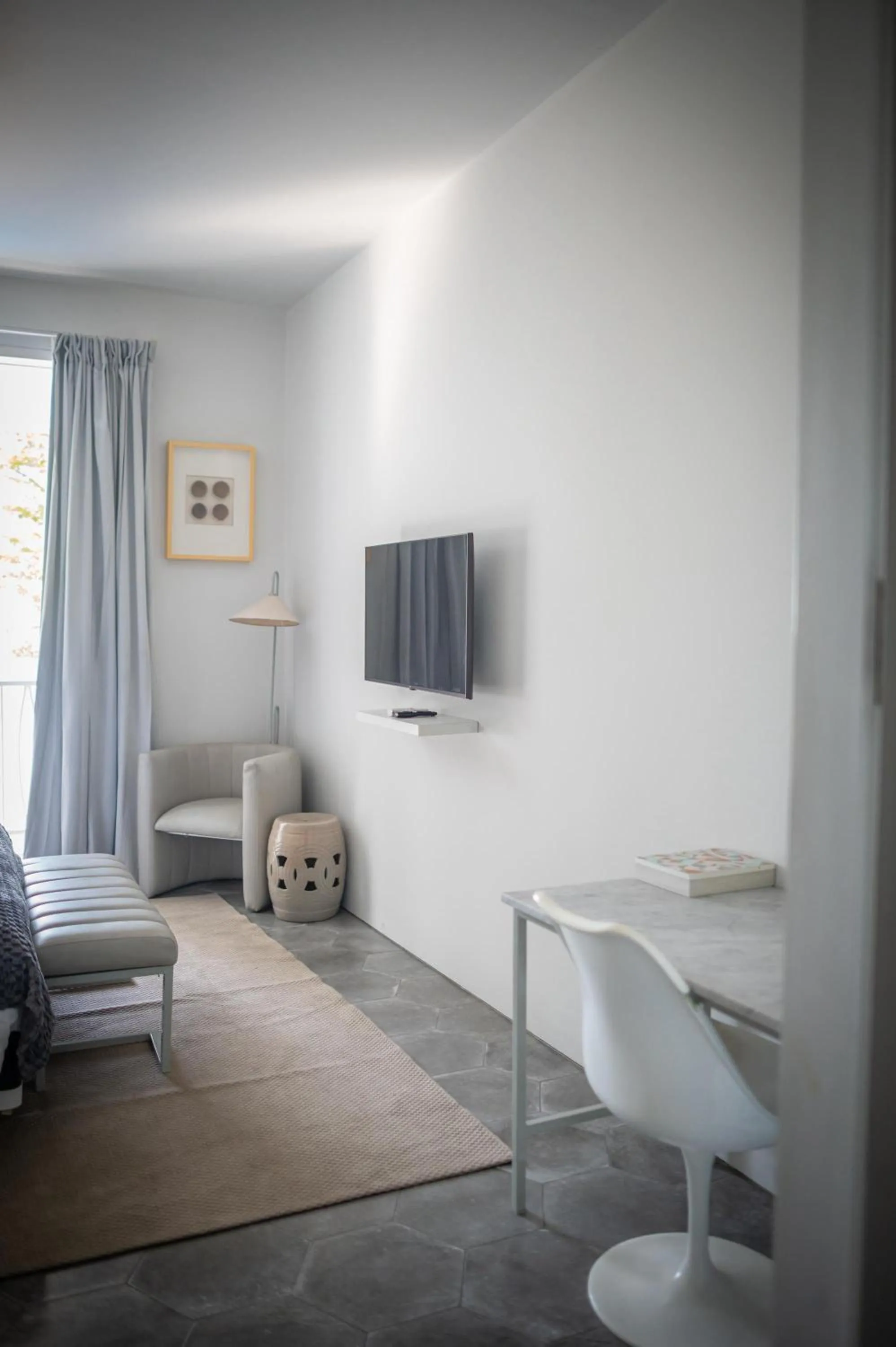 Communal lounge/ TV room, Bed in Lusa Beach Studios Under New Management And Newly Renovated