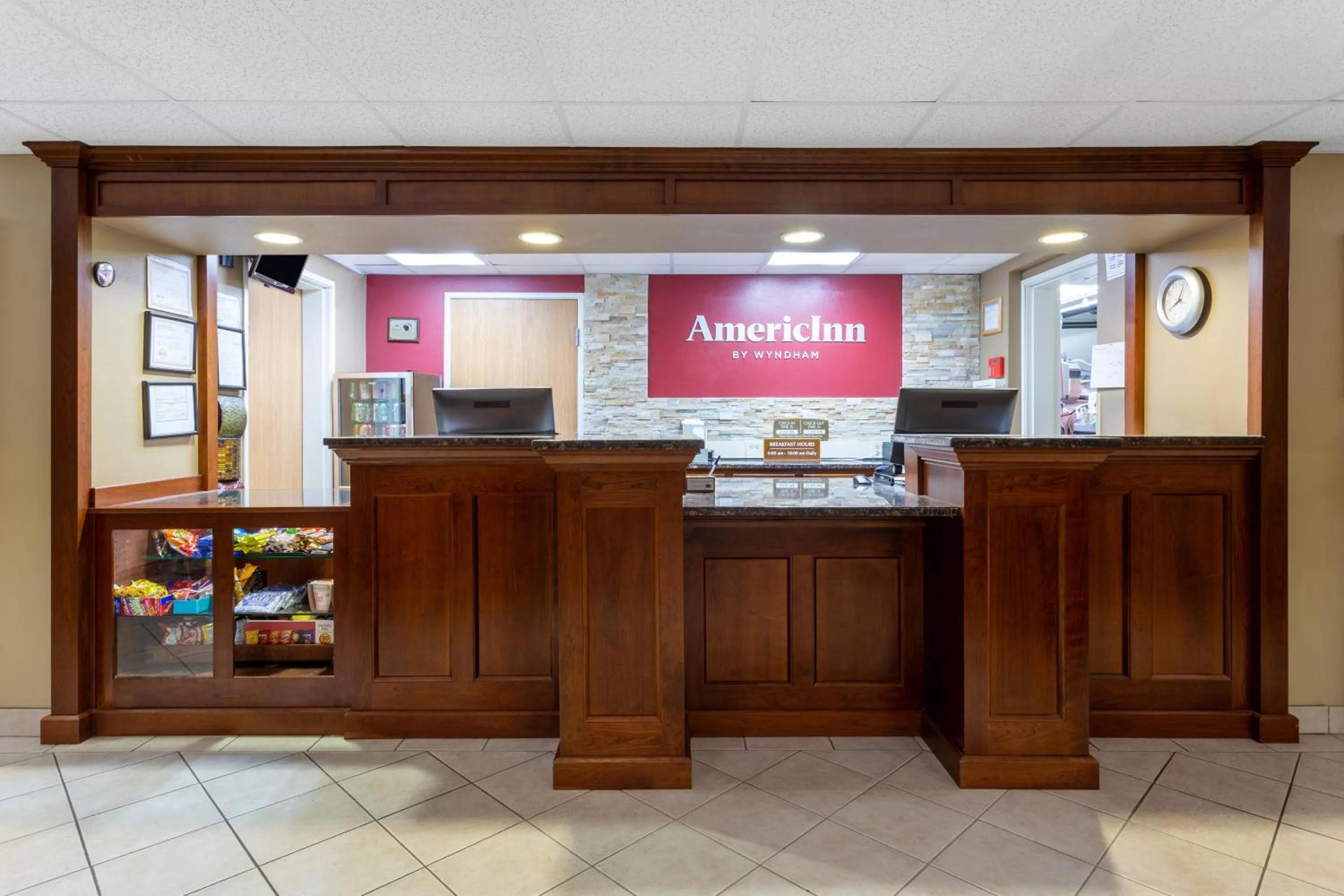 Lobby or reception in AmericInn by Wyndham Wausau