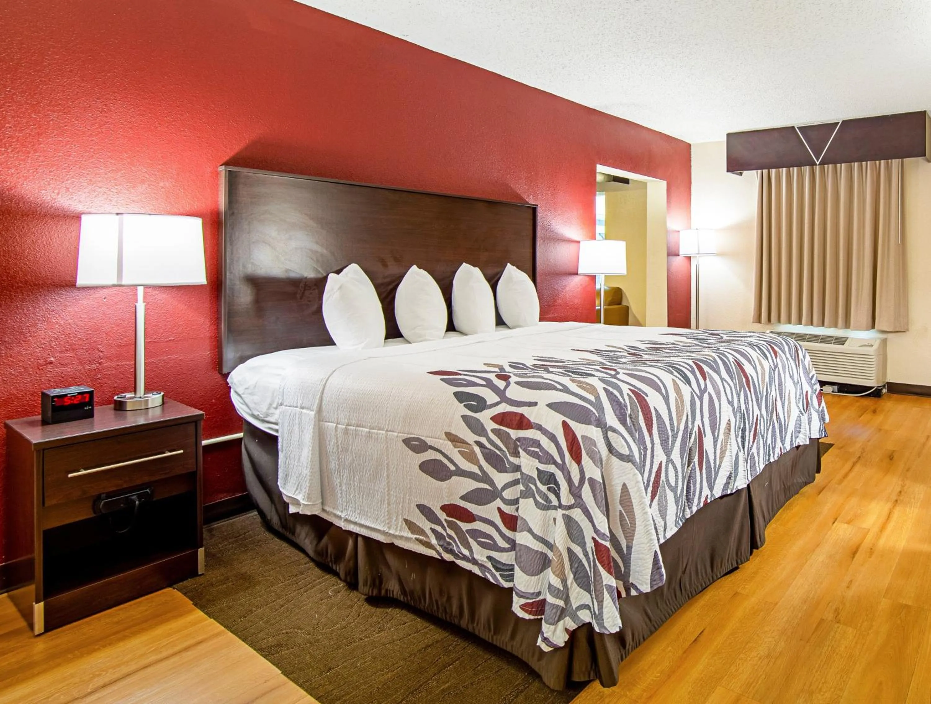 Photo of the whole room, Bed in Red Roof Inn & Suites Greenwood, SC