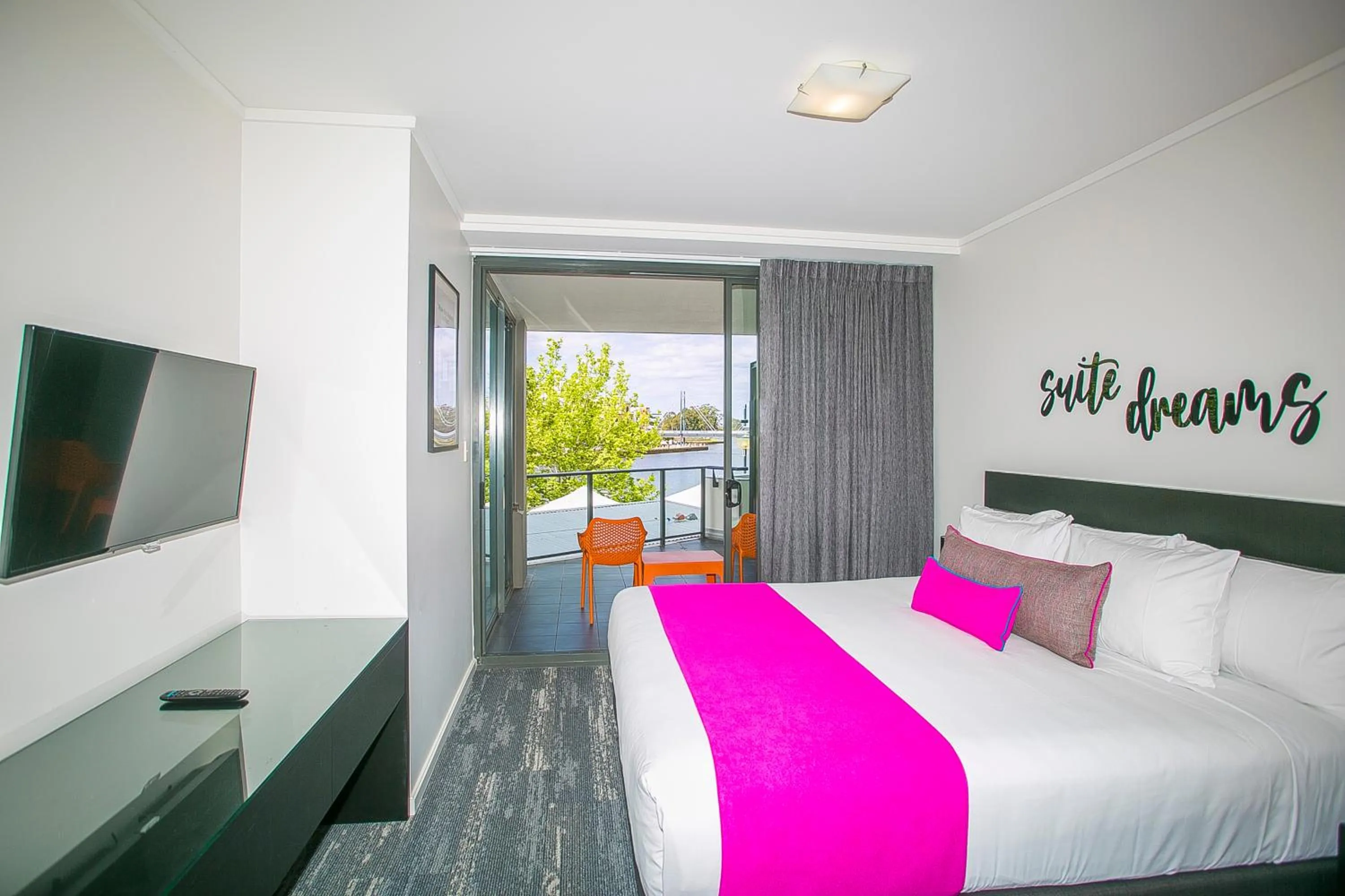 Bed in East Perth Suites Hotel