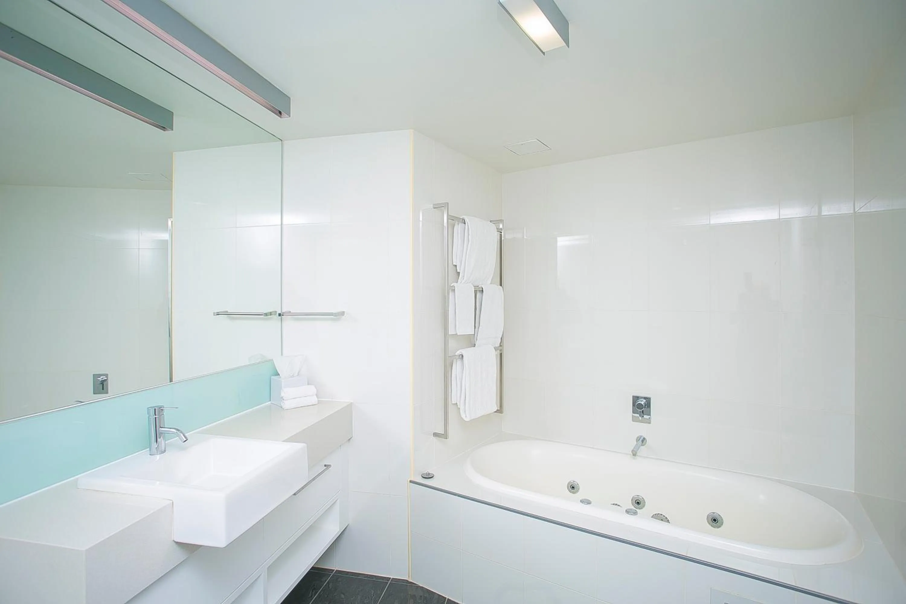 Shower in East Perth Suites Hotel