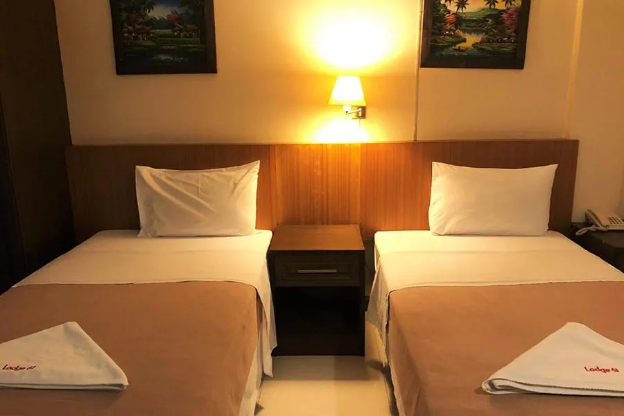 Bed in Lodge 61 Hotel